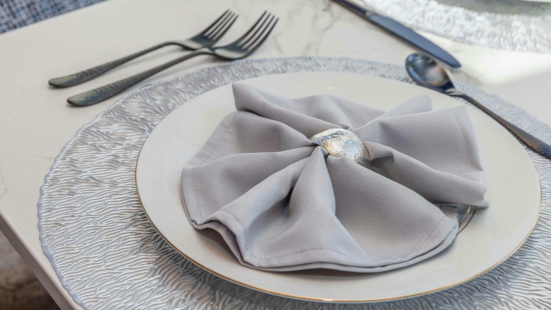 a plate with a knife and a knife on it aboard DEVENZO Yacht for Sale