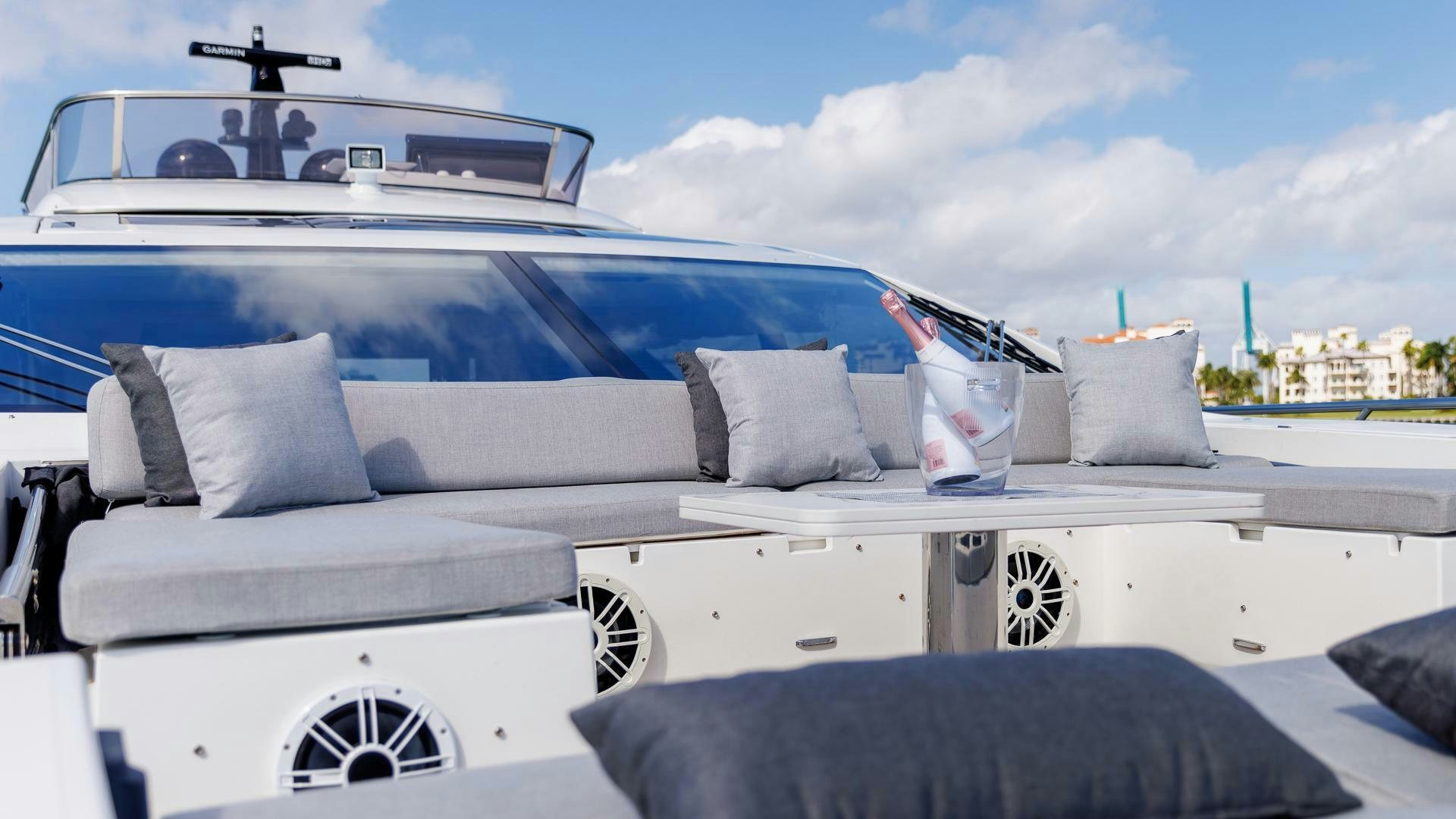 a white car with pillows aboard DEVENZO Yacht for Sale