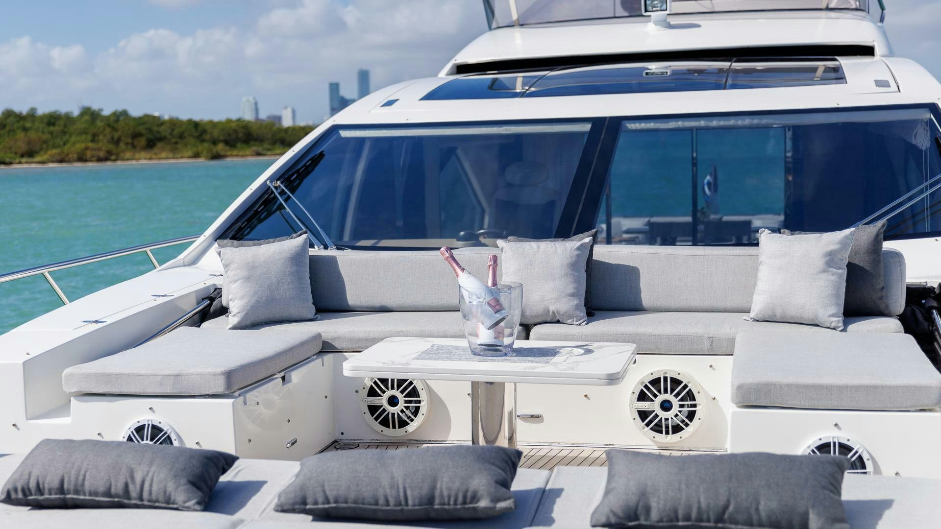 a white luxury car aboard DEVENZO Yacht for Sale