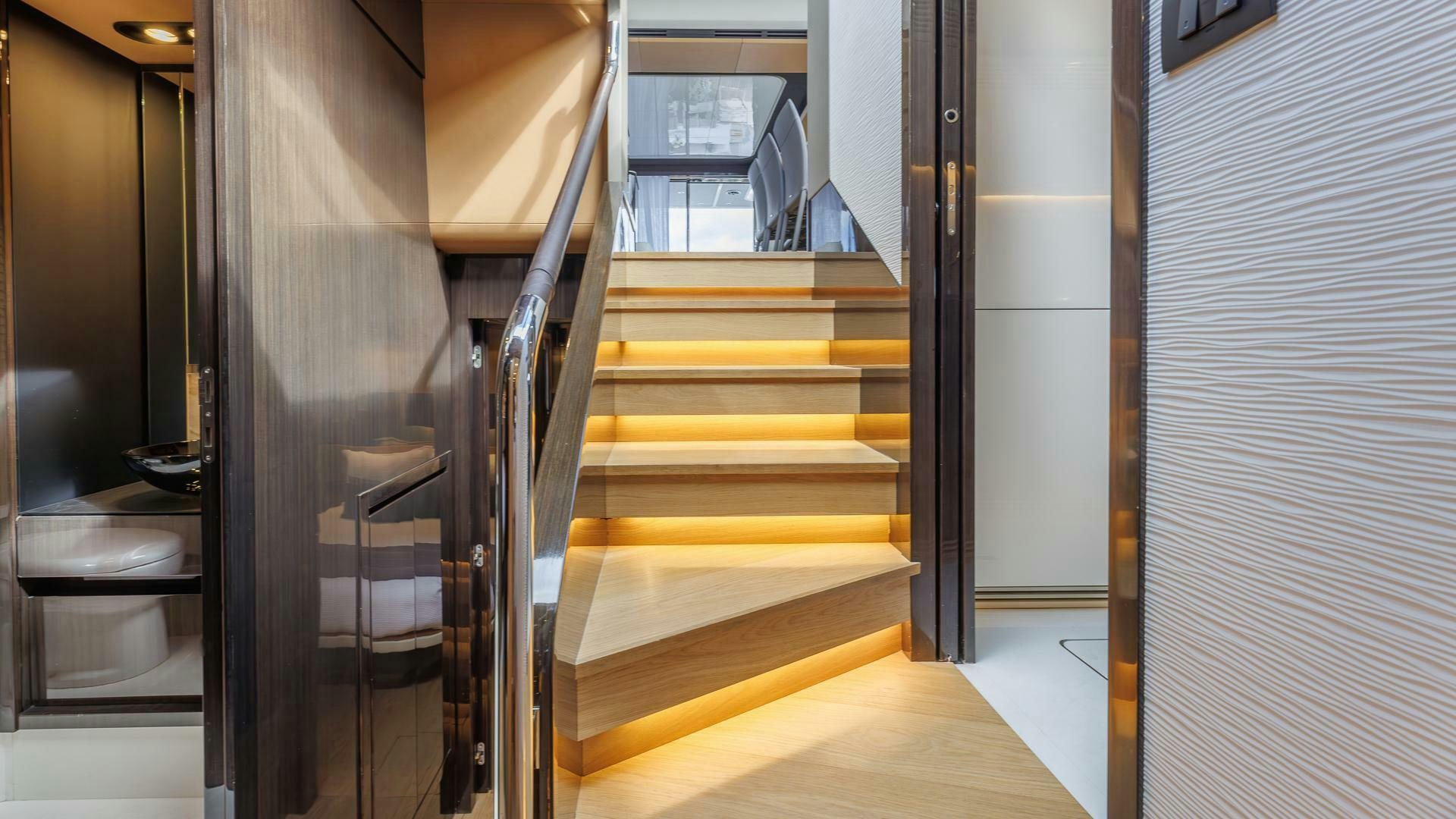 a set of stairs in a building aboard DEVENZO Yacht for Sale