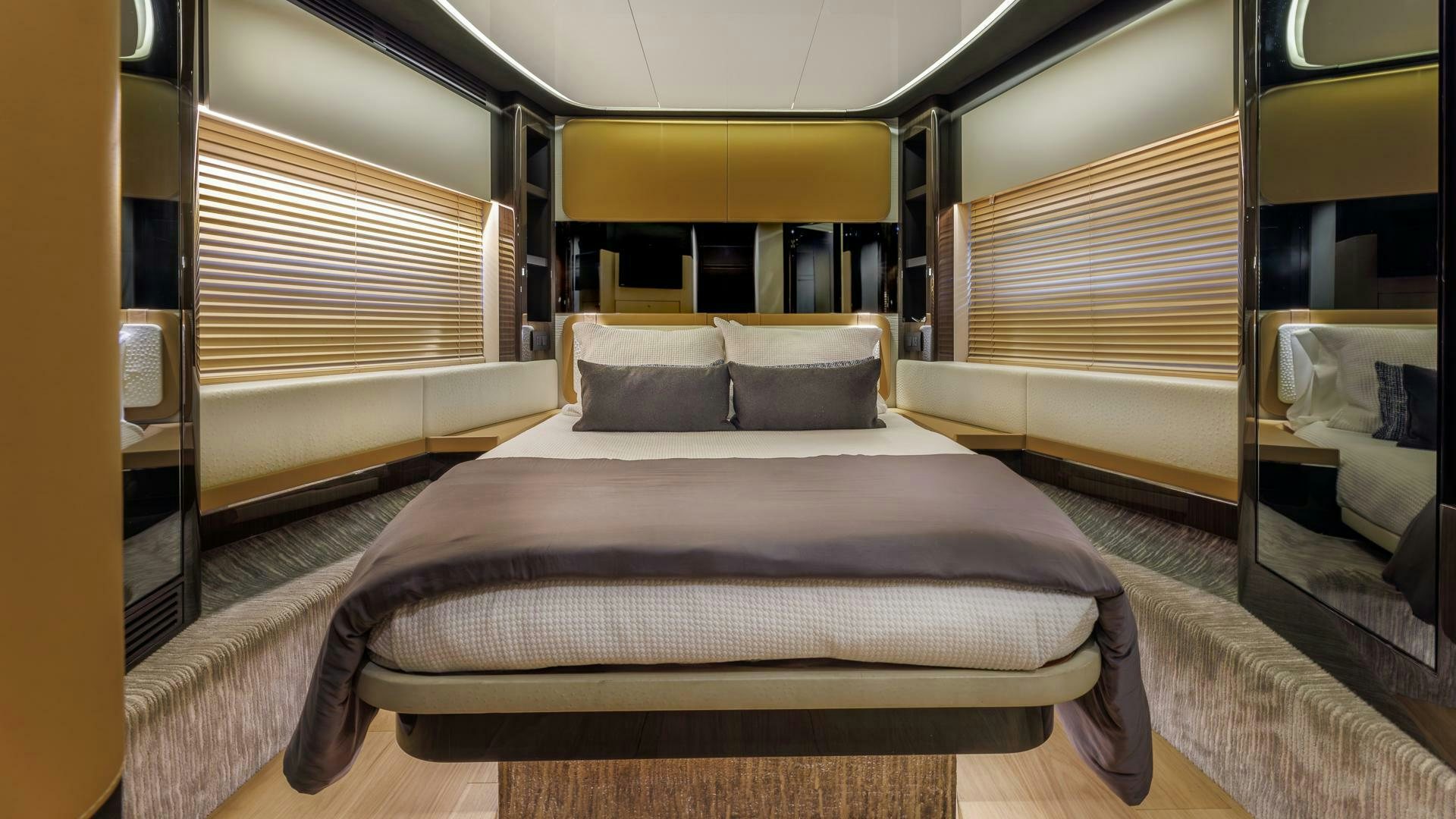 a room with a bed and a window aboard DEVENZO Yacht for Sale