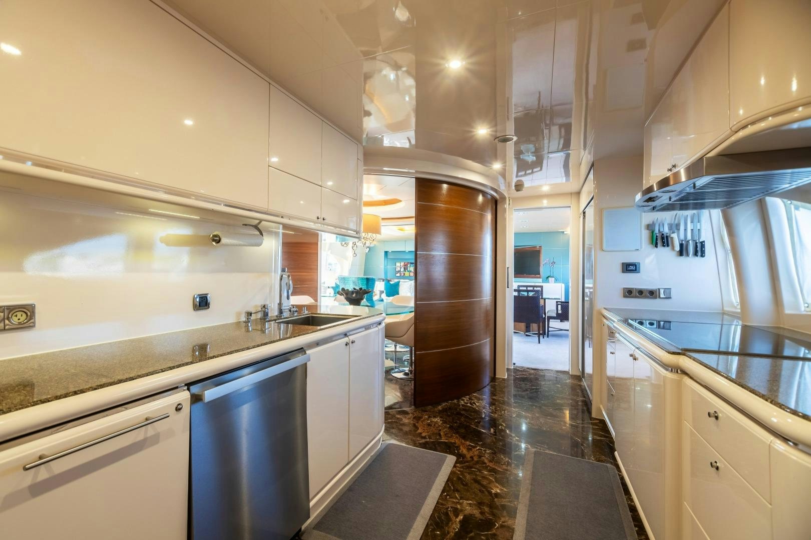 a kitchen with stainless steel appliances aboard GRANDEUR Yacht for Sale