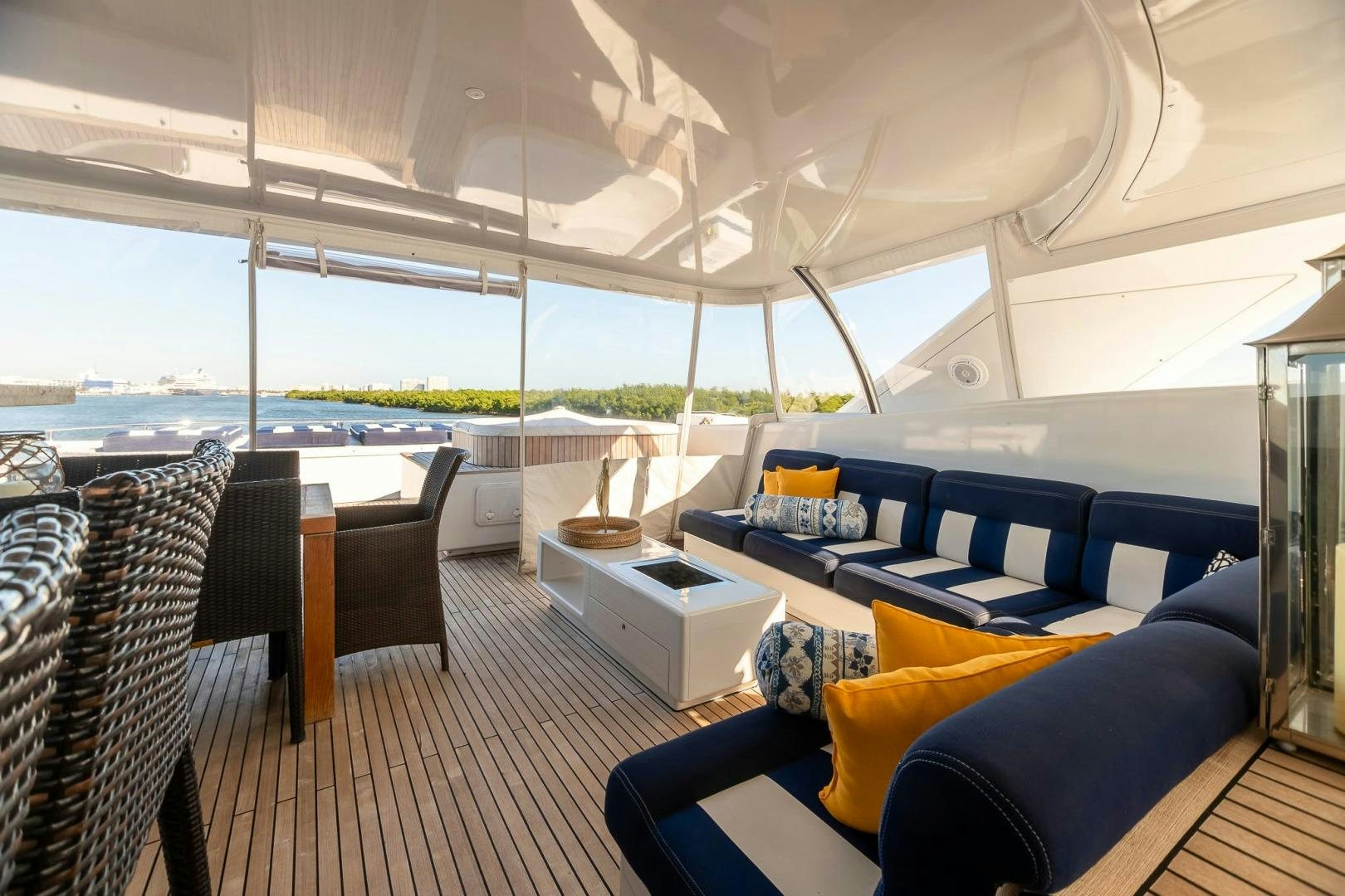 a large living room with a large window aboard GRANDEUR Yacht for Sale