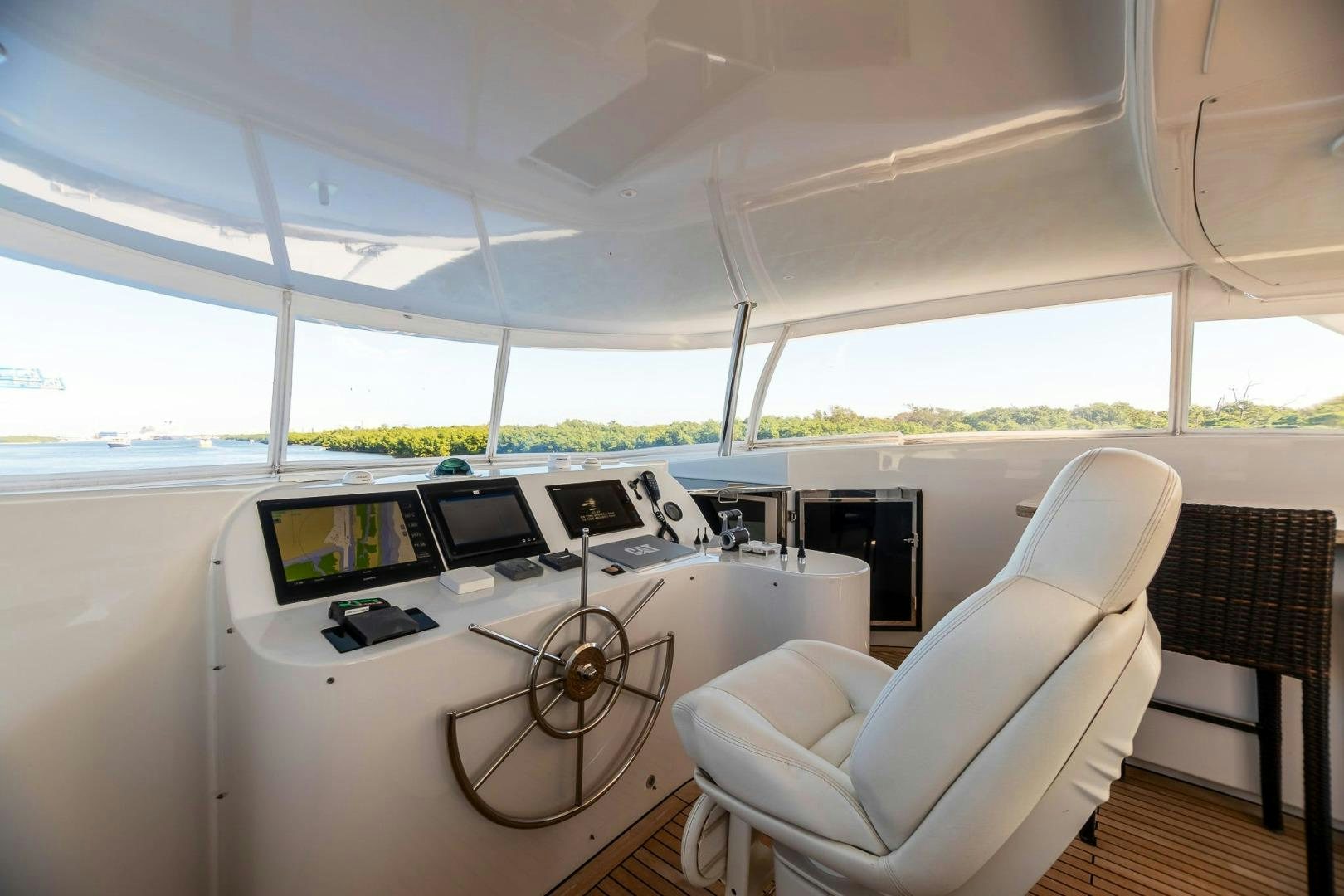 a white tent with a desk and computer equipment aboard GRANDEUR Yacht for Sale