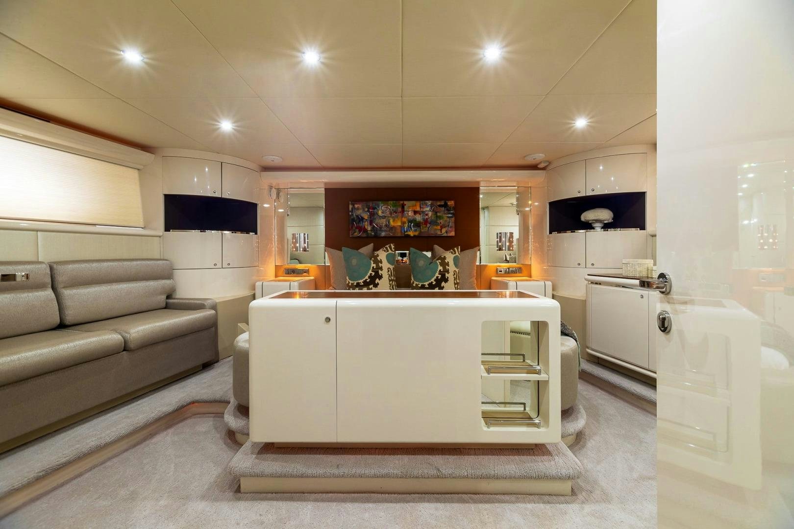 a kitchen with a couch and a table aboard GRANDEUR Yacht for Sale