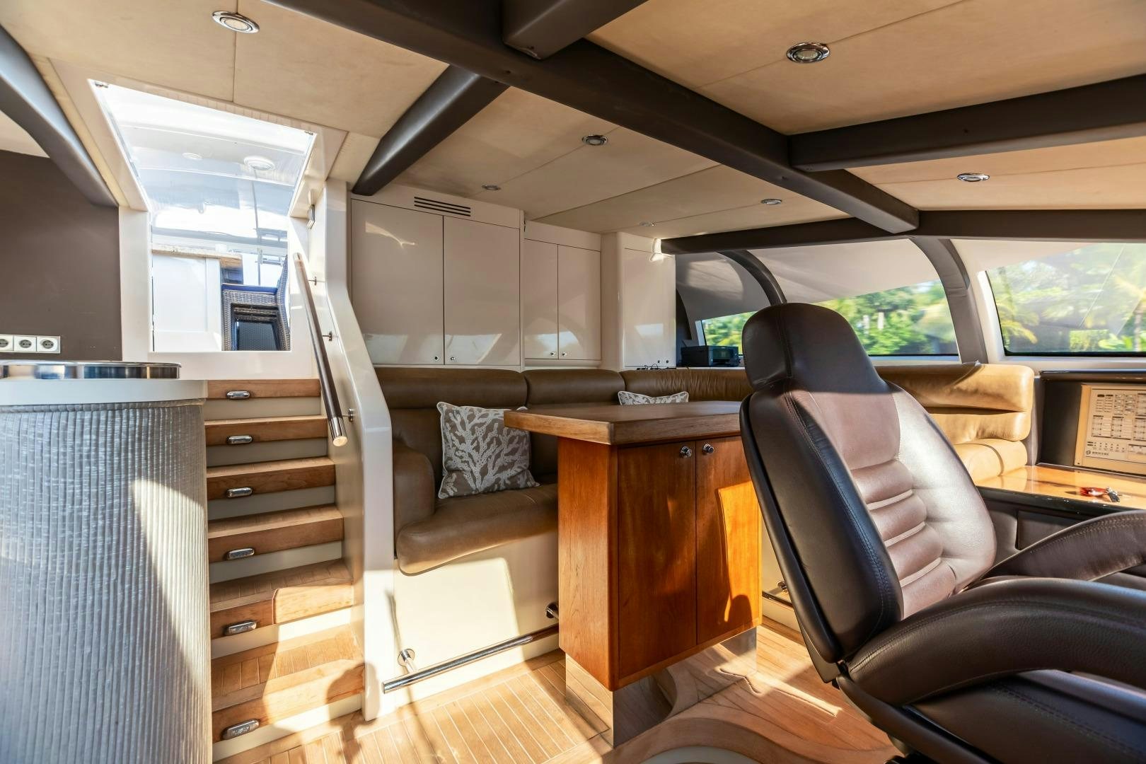 a room with a couch and a chair aboard GRANDEUR Yacht for Sale