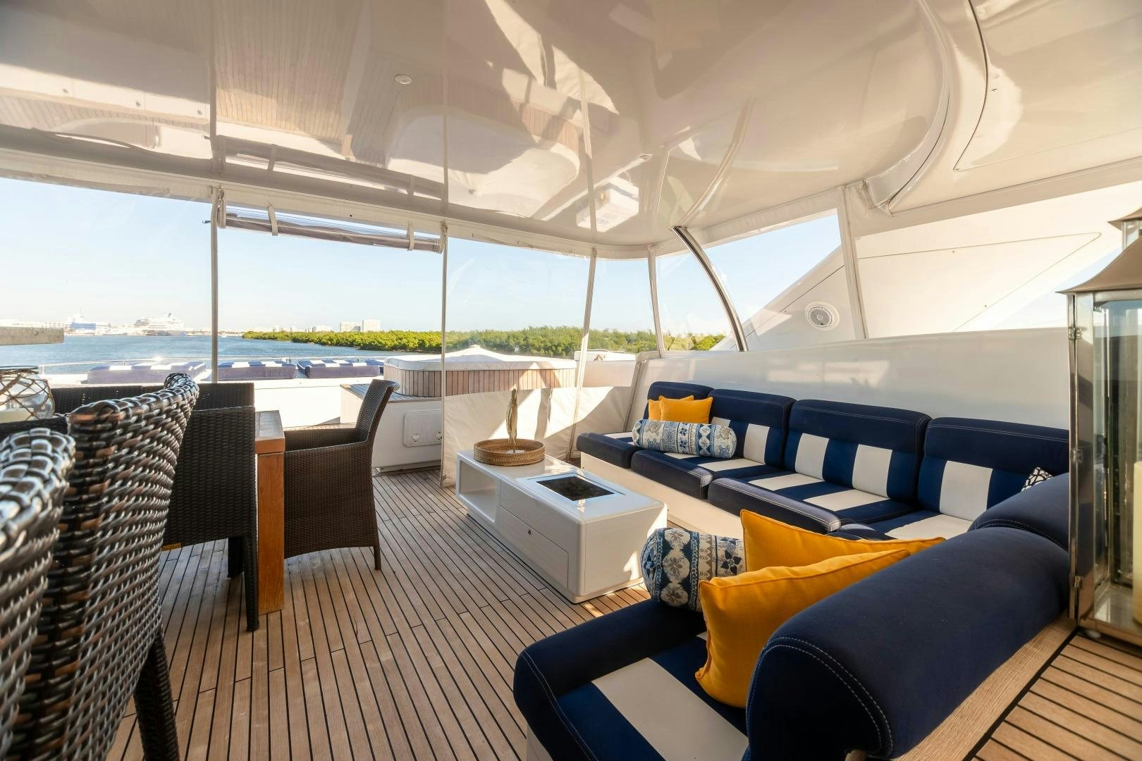 a large living room with a large window aboard GRANDEUR Yacht for Sale