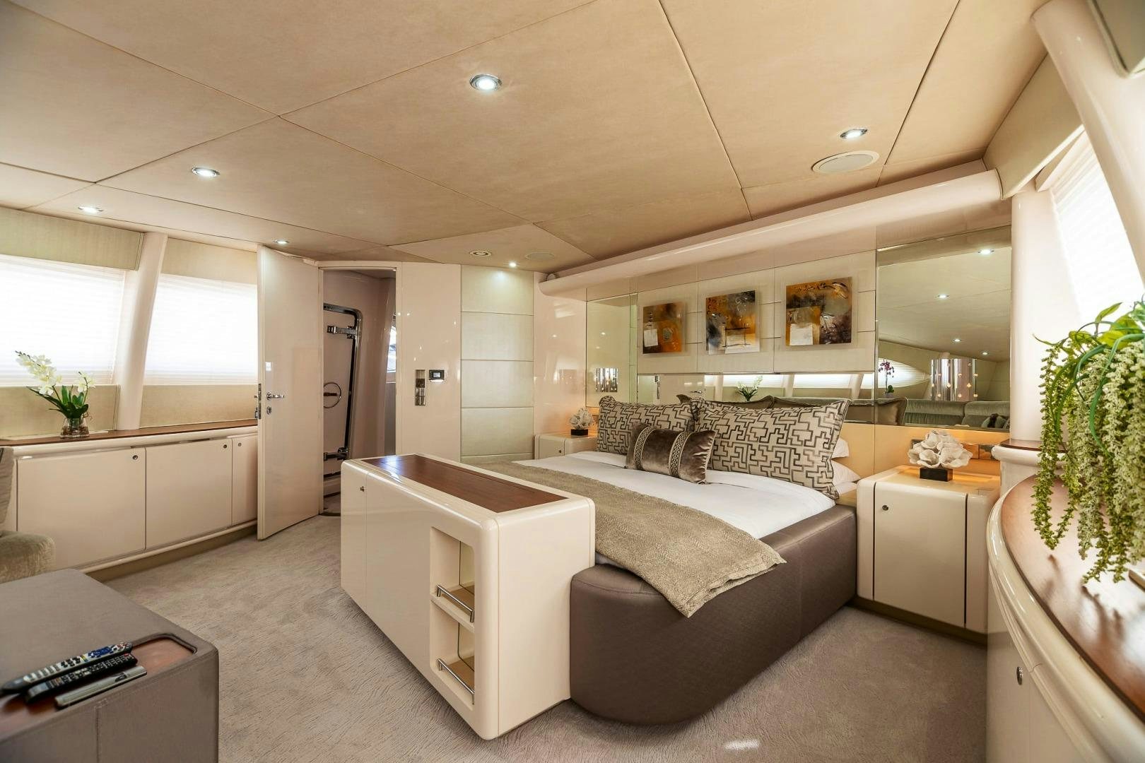 a living room with a couch and a table aboard GRANDEUR Yacht for Sale