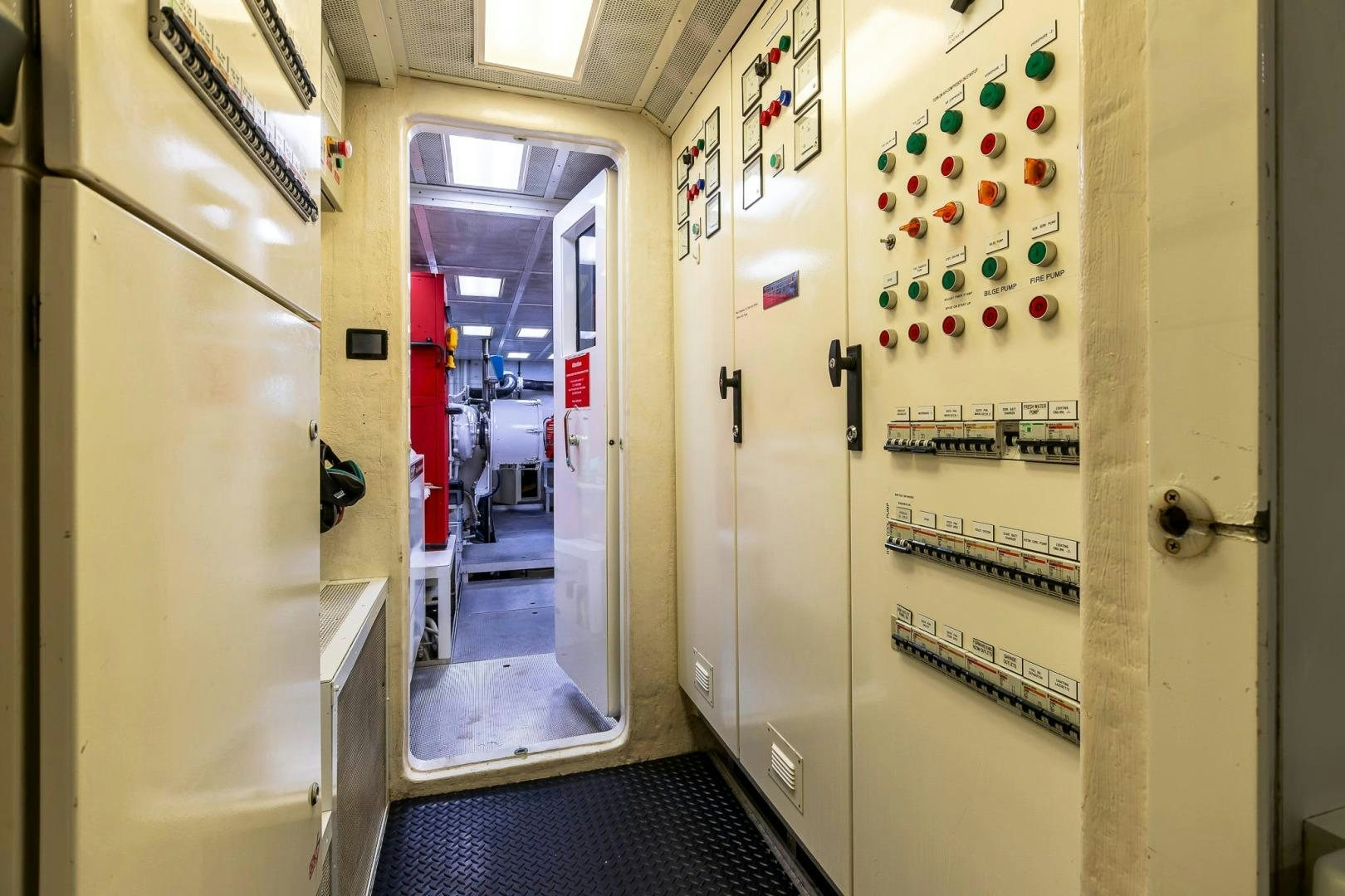 a hallway with white doors aboard GRANDEUR Yacht for Sale