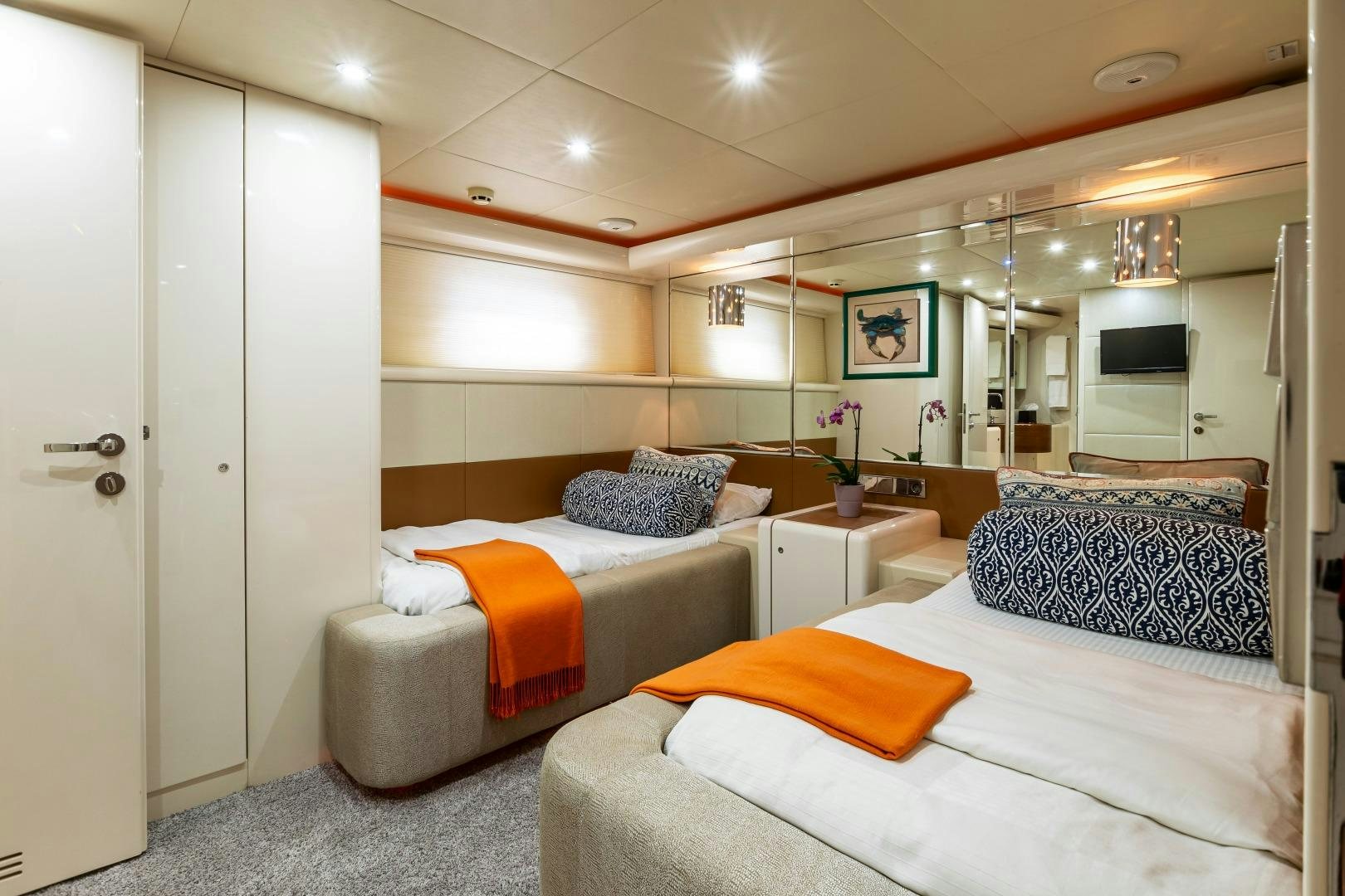 a room with two beds aboard GRANDEUR Yacht for Sale
