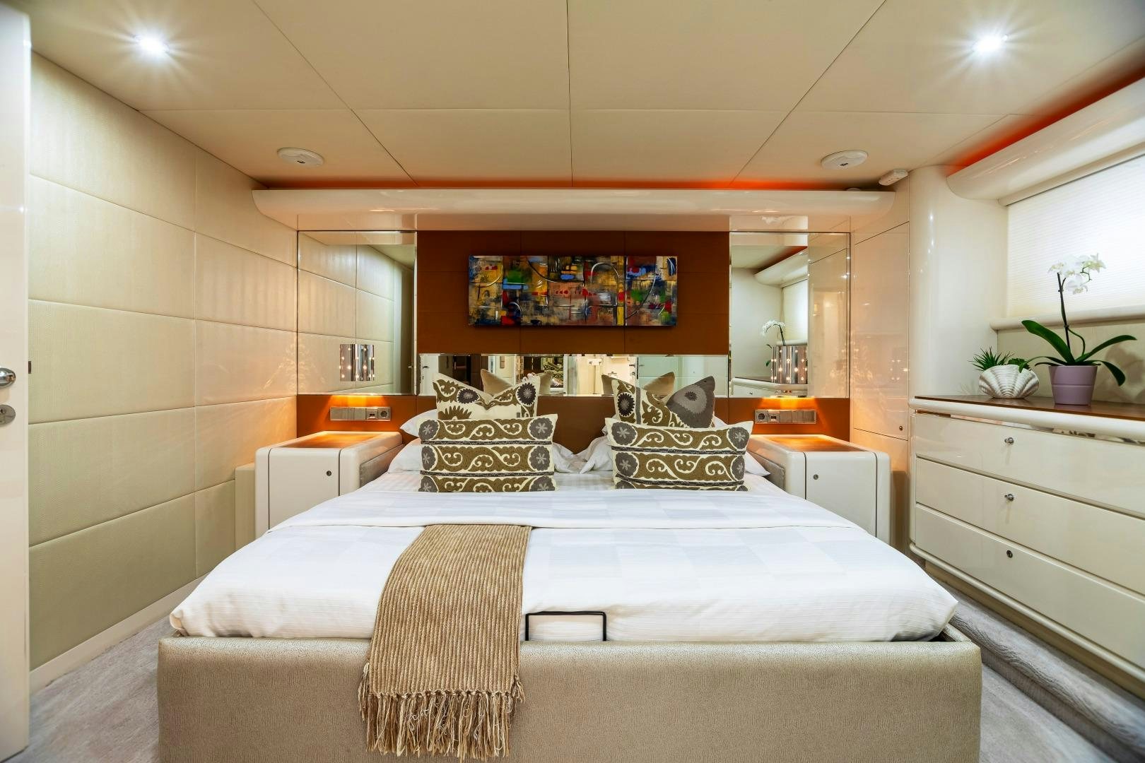 a large bed in a room aboard GRANDEUR Yacht for Sale
