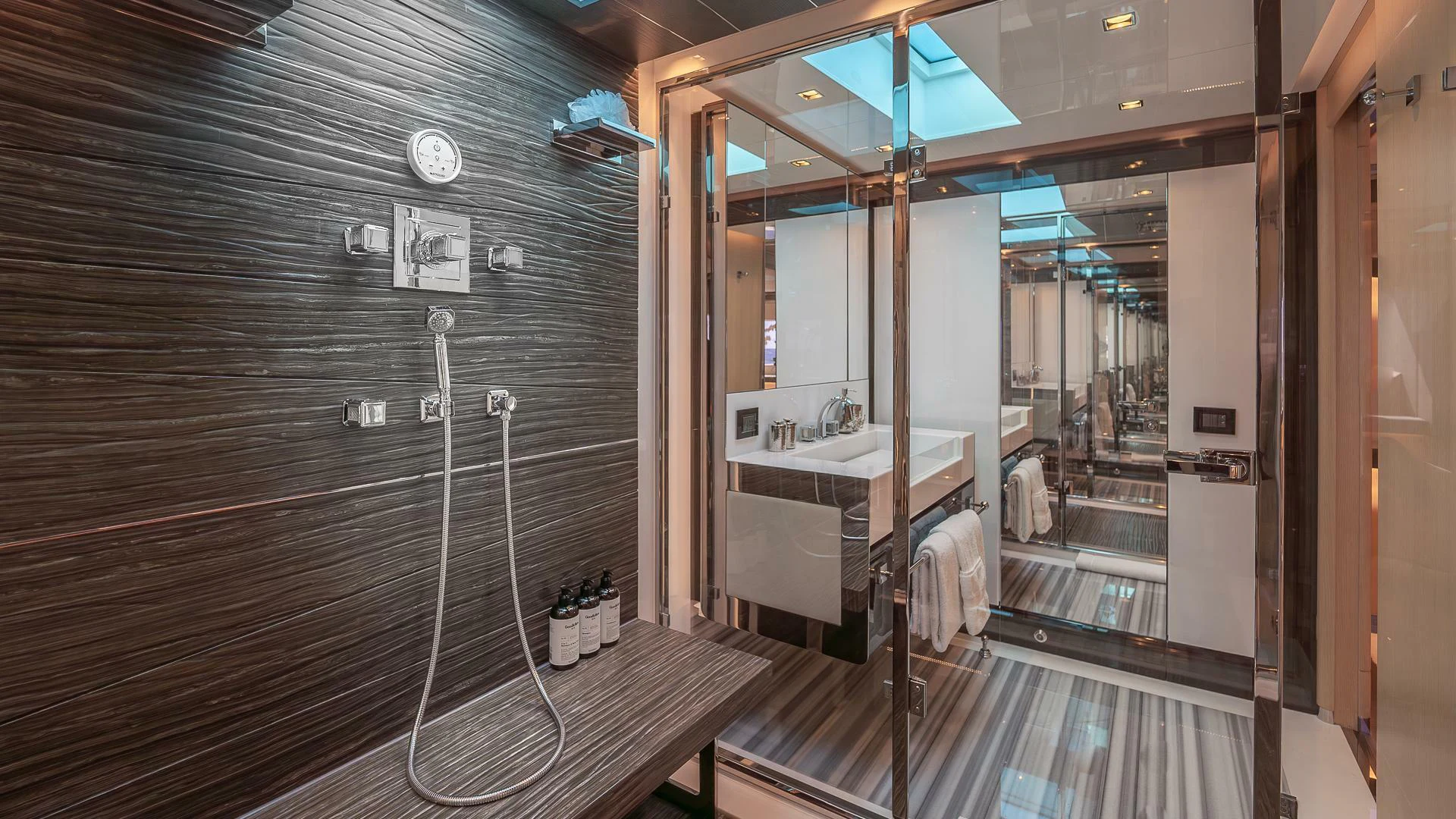 a bathroom with a shower unit aboard NAMASTE Yacht for Sale