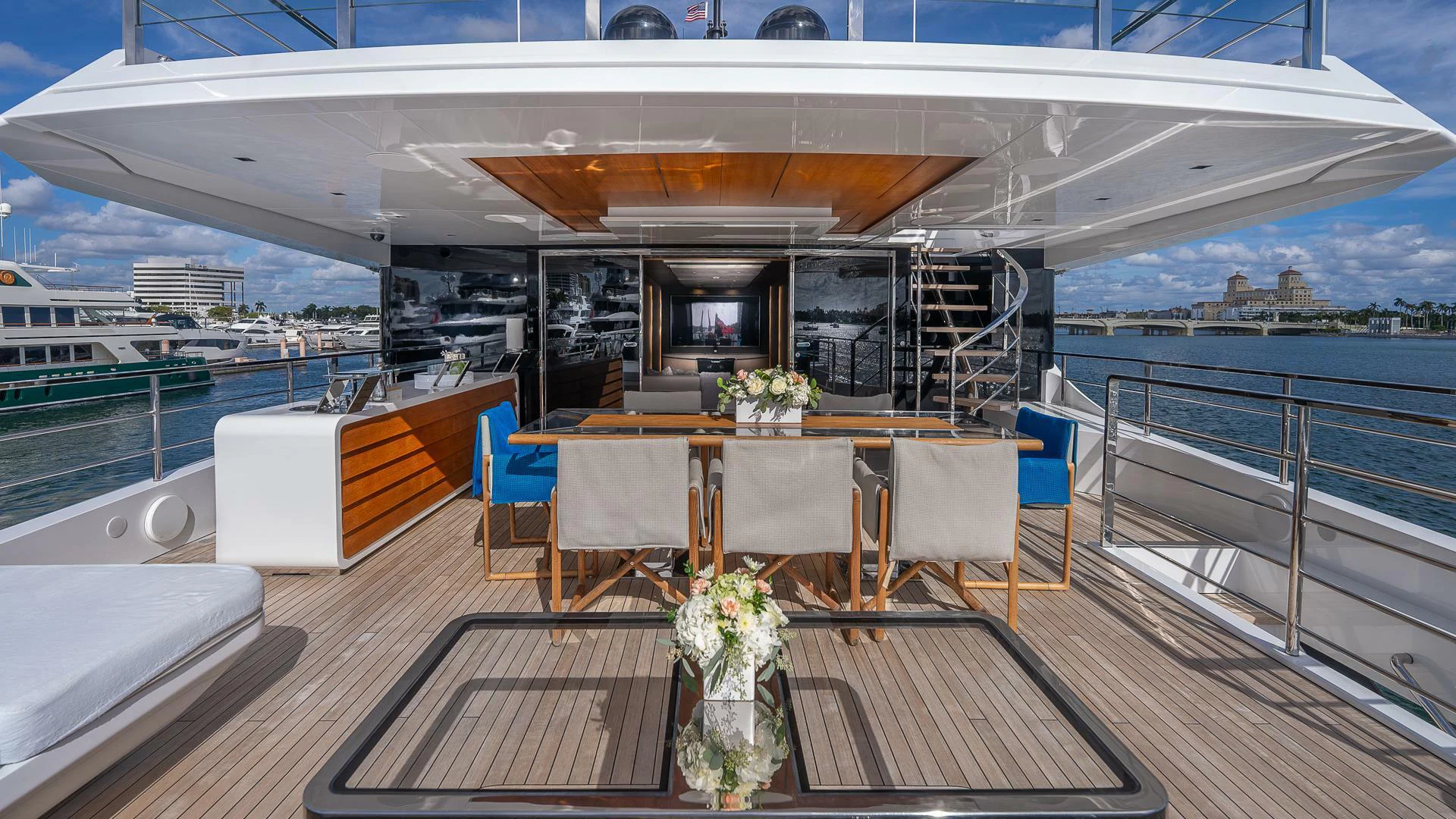 a room with a table and chairs aboard NAMASTE Yacht for Sale