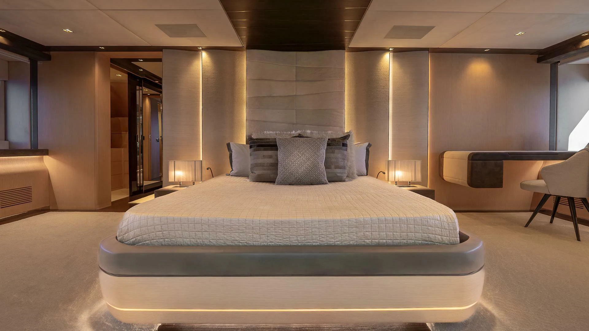 a large bed in a room aboard NAMASTE Yacht for Sale