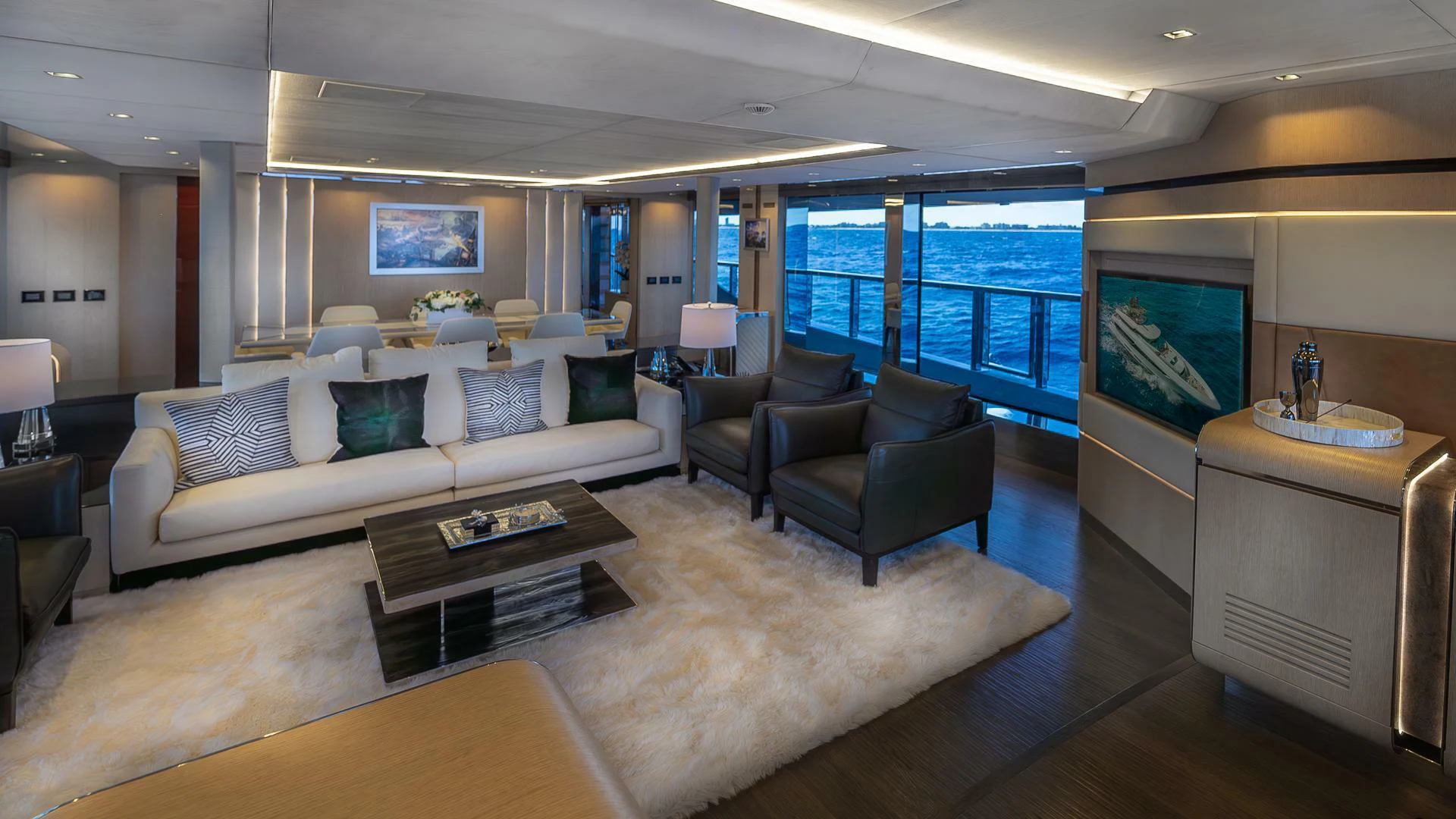 a living room with a large window aboard NAMASTE Yacht for Sale