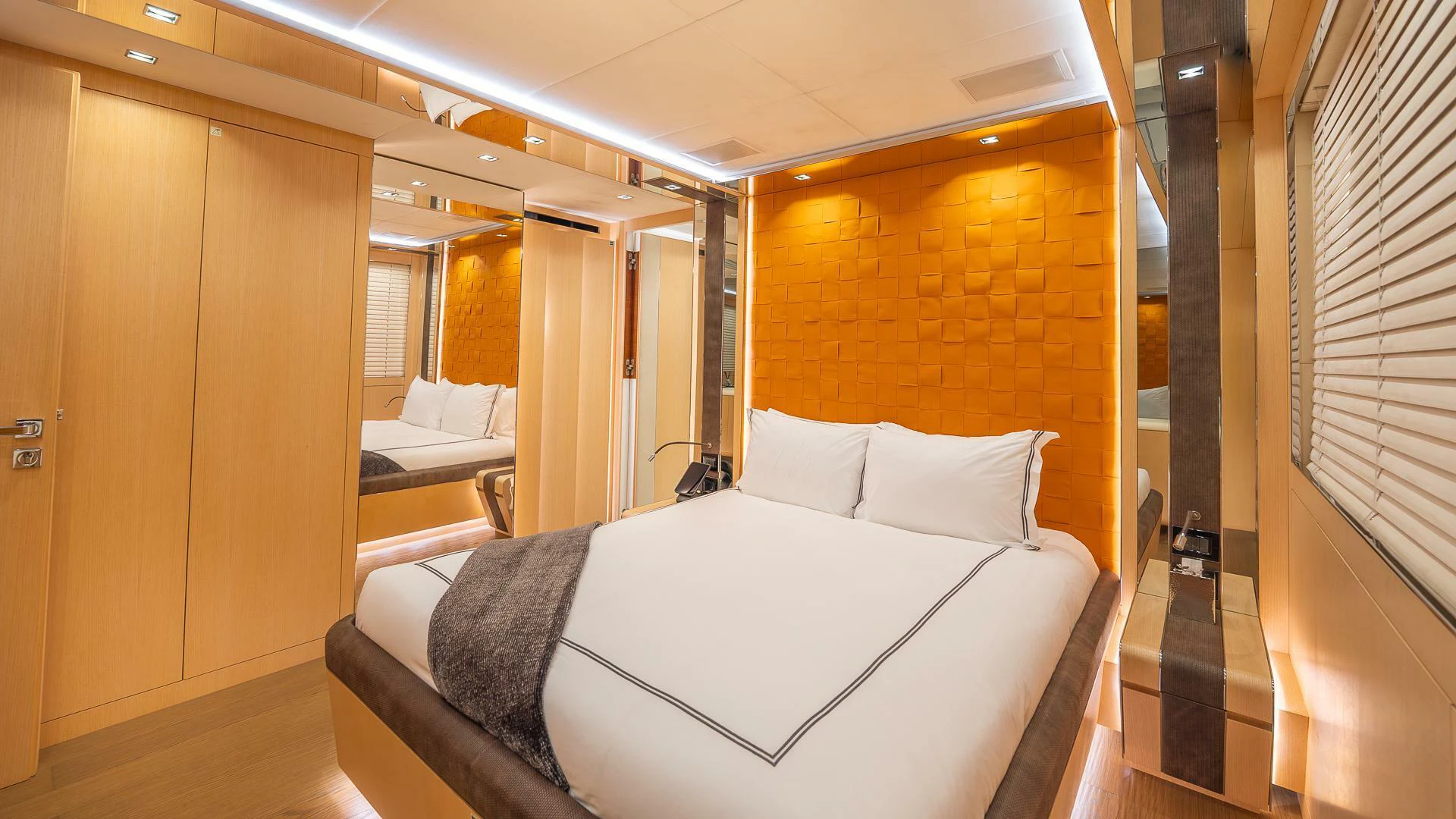 a hotel room with a bed aboard NAMASTE Yacht for Sale