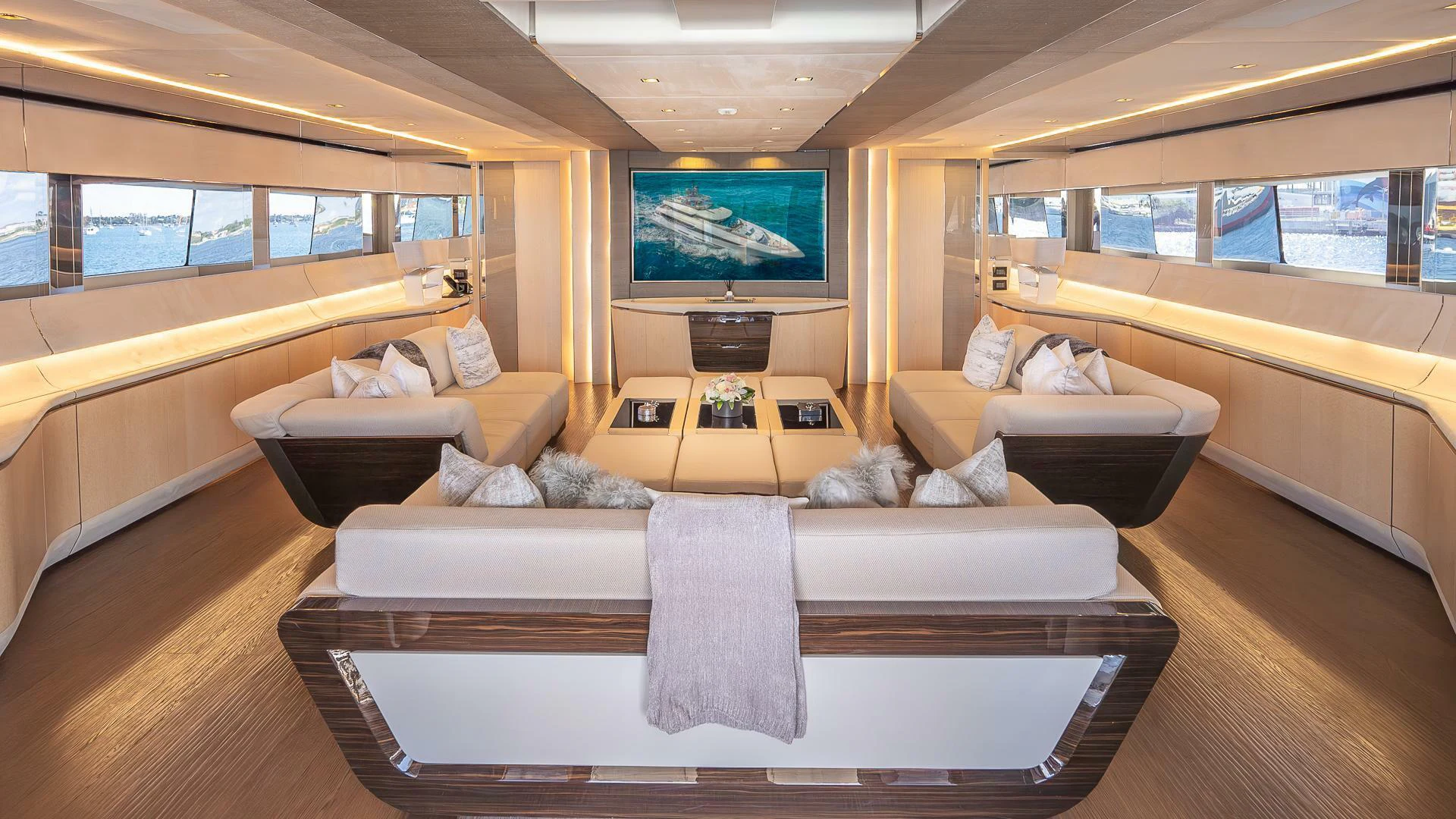 a living room with a large screen aboard NAMASTE Yacht for Sale