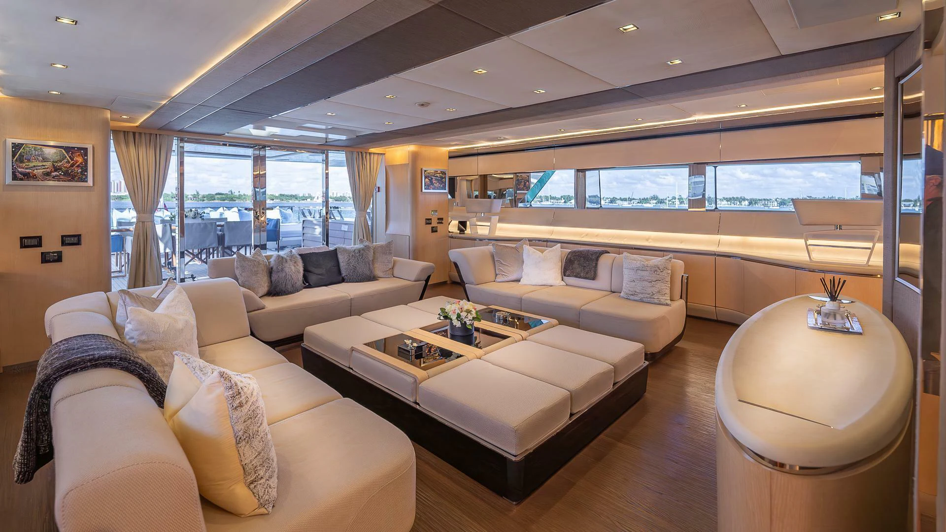 a living room with a large window aboard NAMASTE Yacht for Sale