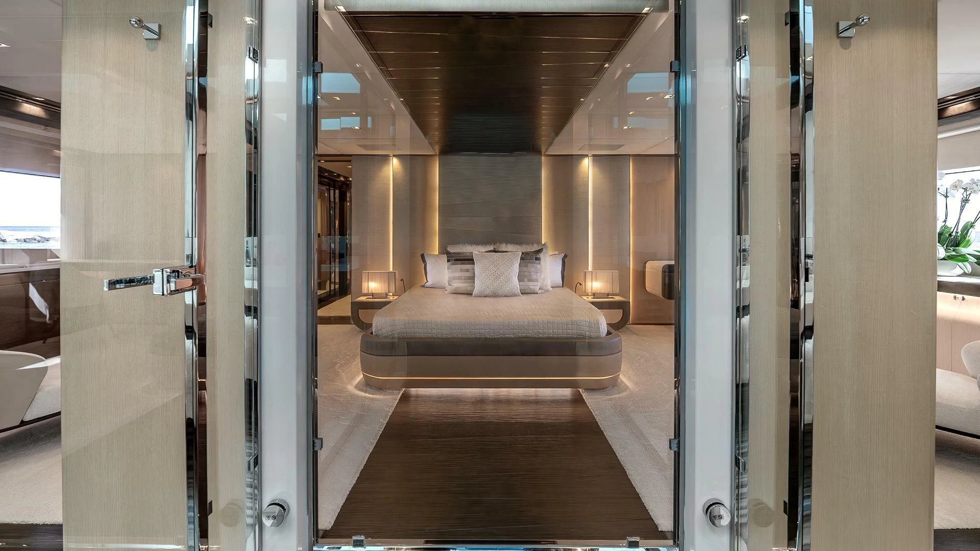 a room with a bed and a couch aboard NAMASTE Yacht for Sale