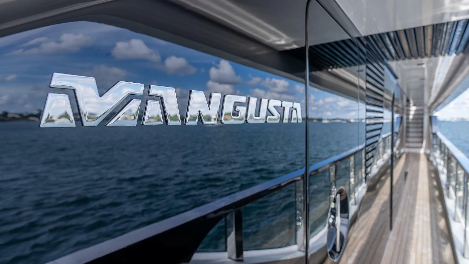 a large ship with a large glass window aboard NAMASTE Yacht for Sale