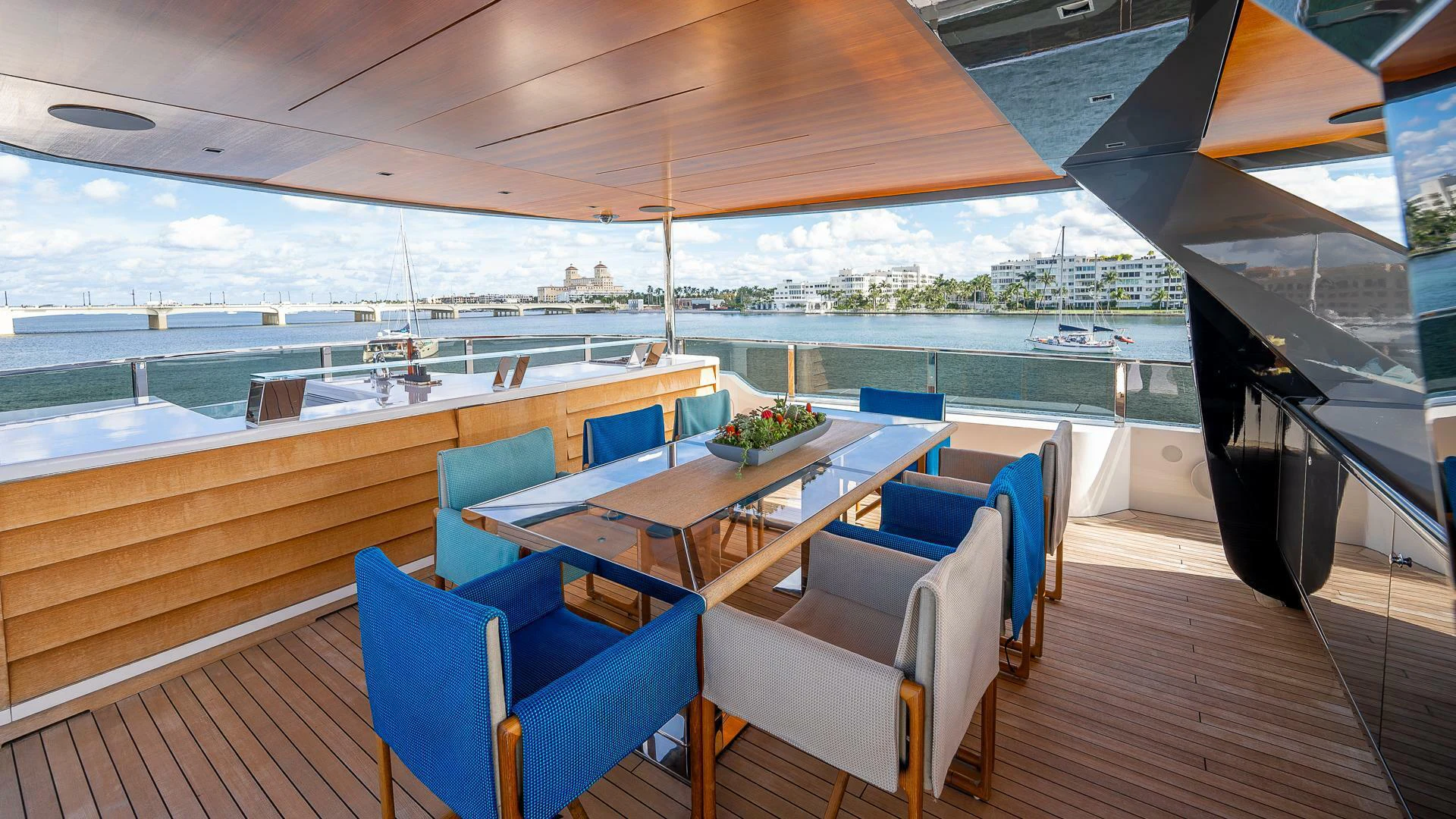 a table and chairs on a deck aboard NAMASTE Yacht for Sale