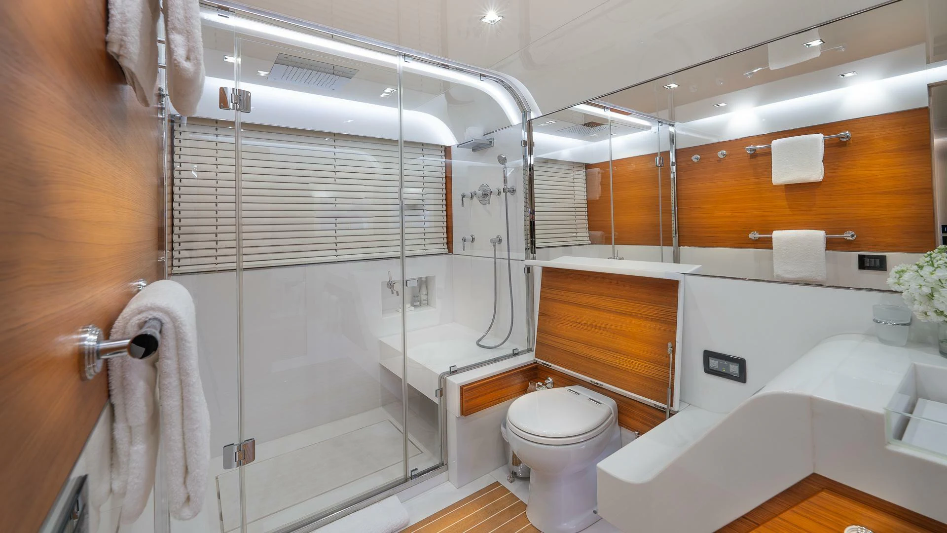 a bathroom with a shower and toilet aboard NAMASTE Yacht for Sale