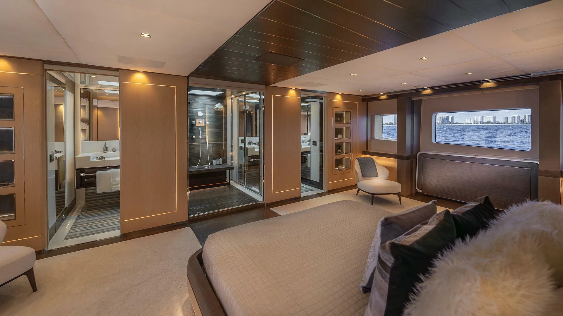 a living room with a couch and a tv aboard NAMASTE Yacht for Sale
