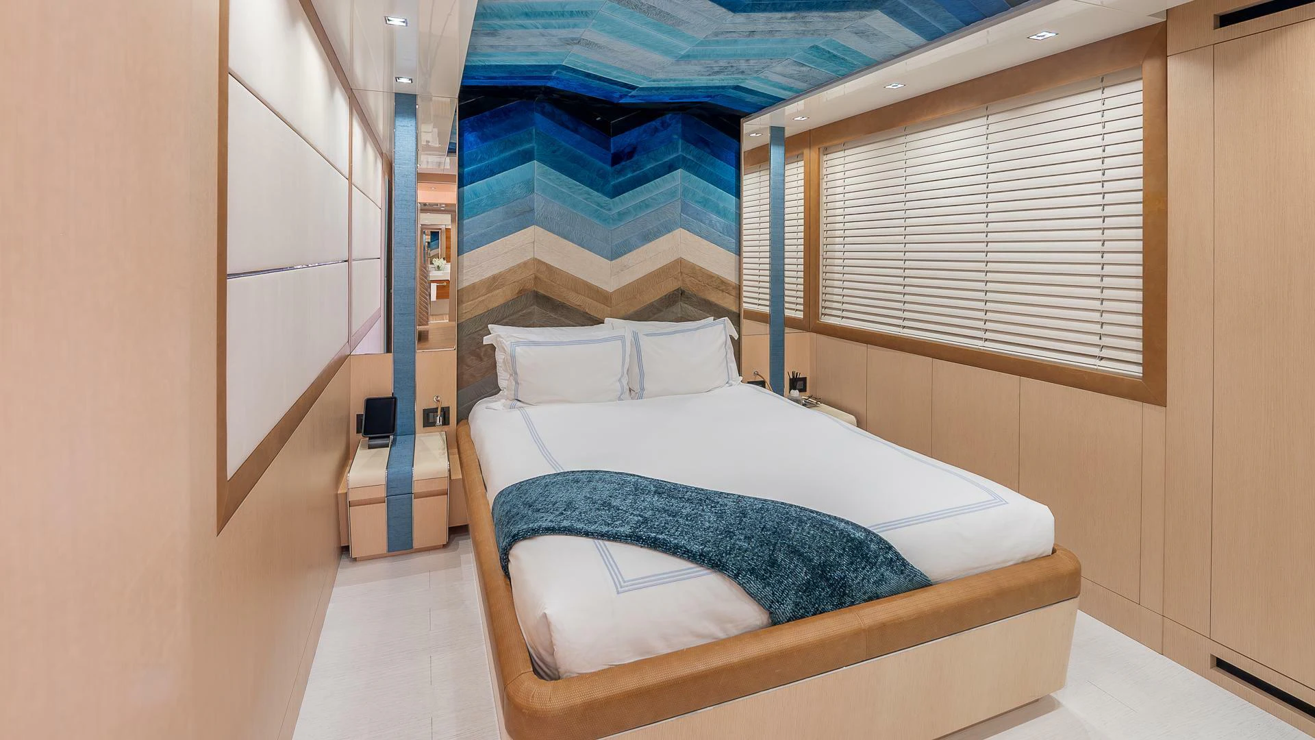 a bed in a room aboard NAMASTE Yacht for Sale