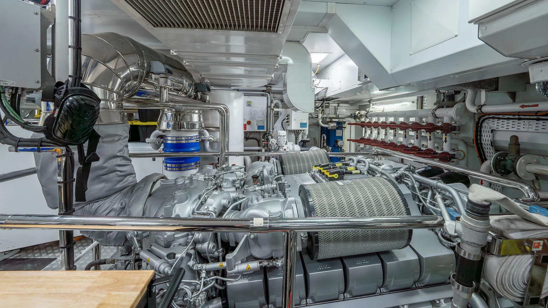 a room with many pipes and tubes aboard NAMASTE Yacht for Sale