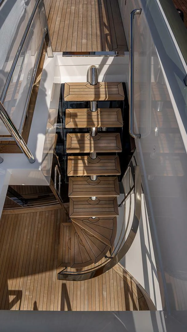 a wooden cabinet with a handle aboard NAMASTE Yacht for Sale