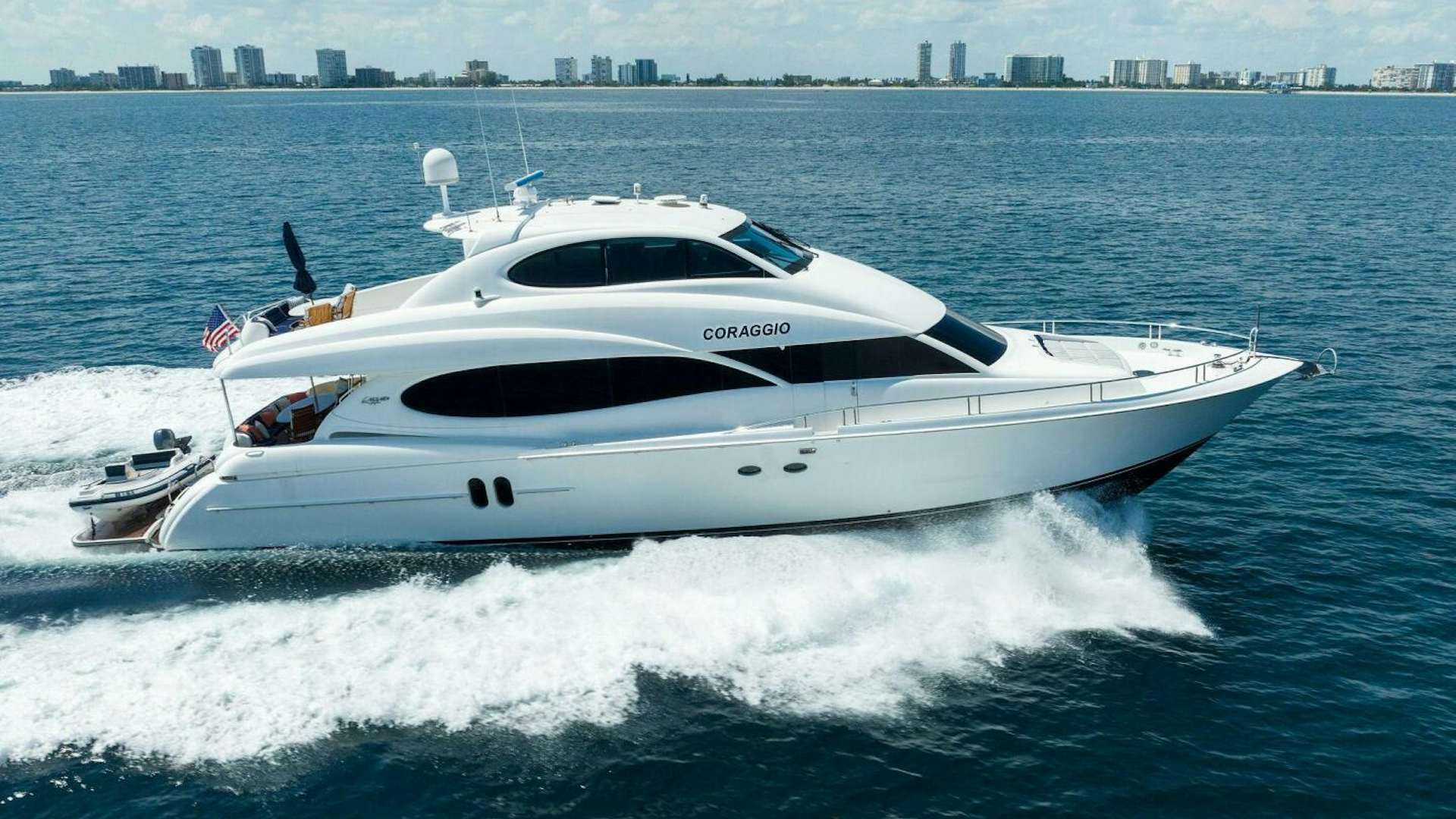 a white yacht on water aboard CORAGGIO Yacht for Sale