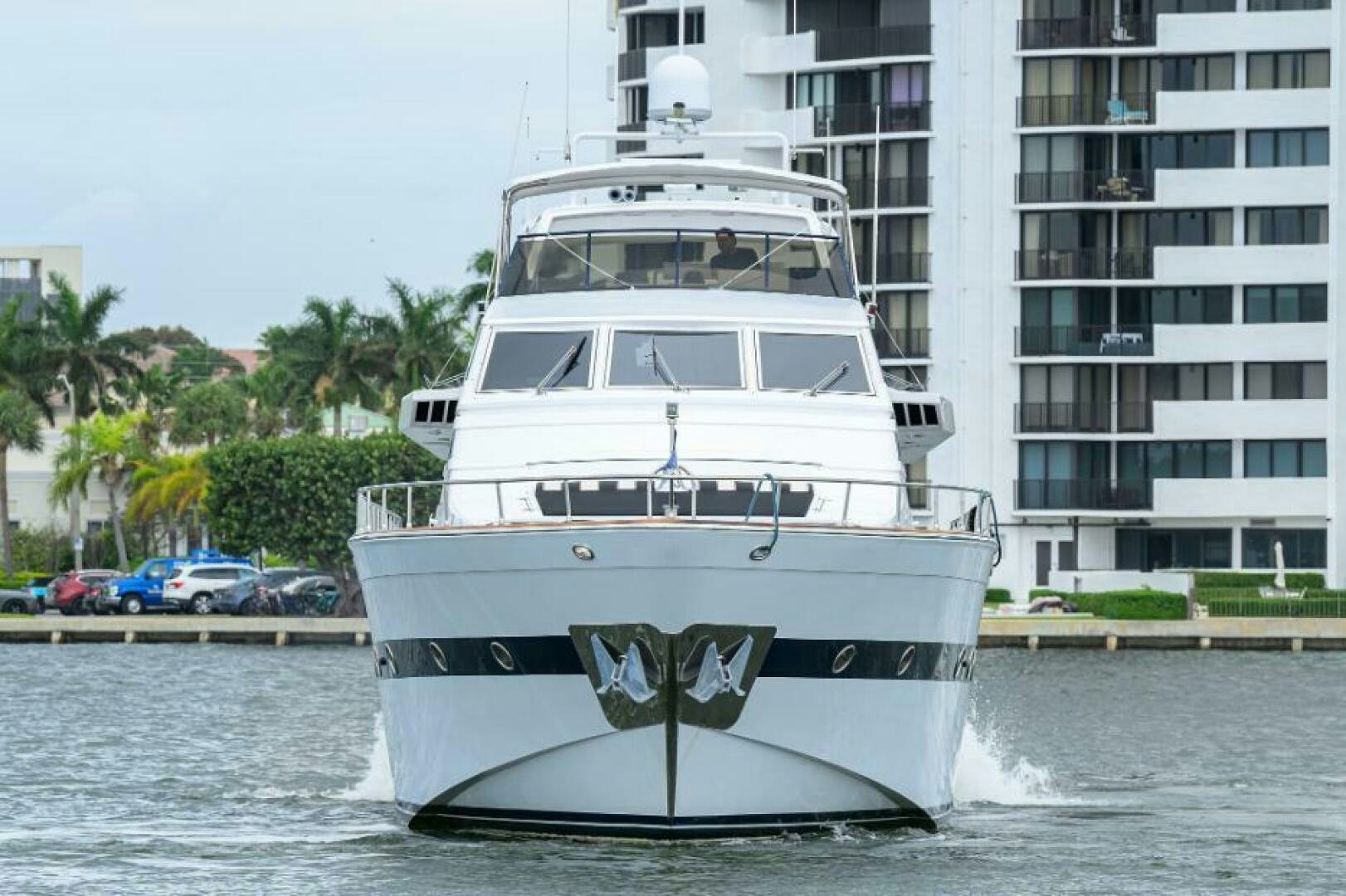 a white boat in the water aboard CIPANGO Yacht for Sale