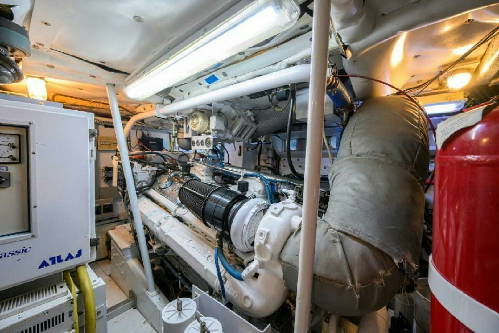 a large metal pipe in a factory aboard CIPANGO Yacht for Sale