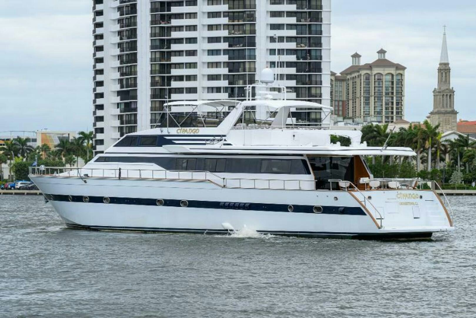 a white yacht in the water aboard CIPANGO Yacht for Sale
