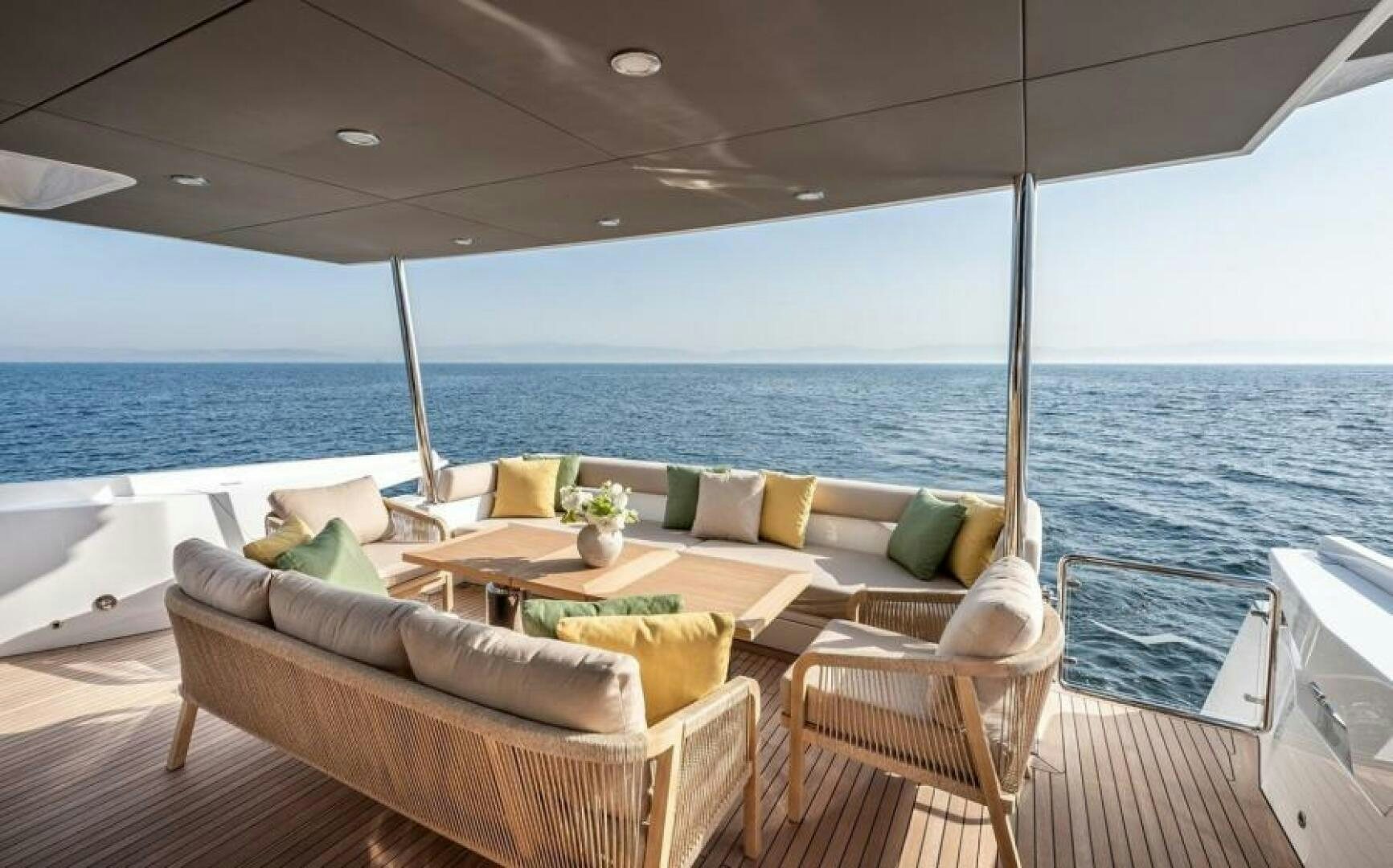 a living room with a large body of water aboard NUMARINE 22XP/07 Yacht for Sale