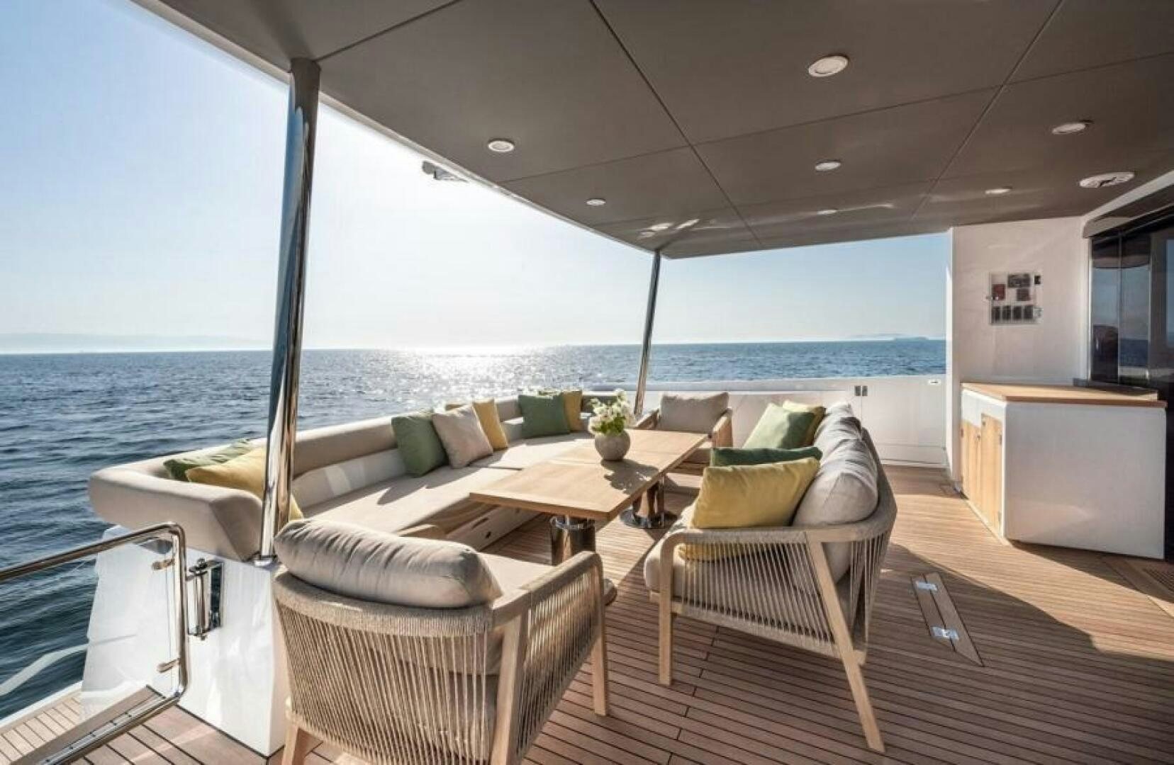 a living room with a large body of water aboard NUMARINE 22XP/07 Yacht for Sale