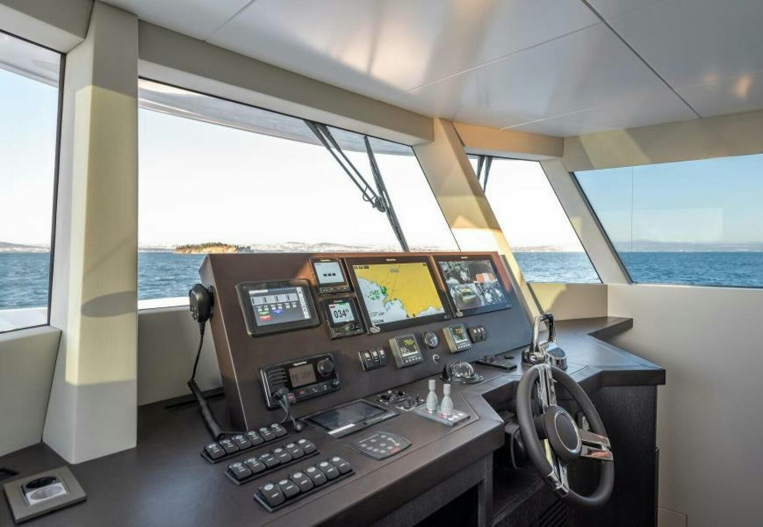 a room with a desk and computer aboard NUMARINE 22XP/07 Yacht for Sale