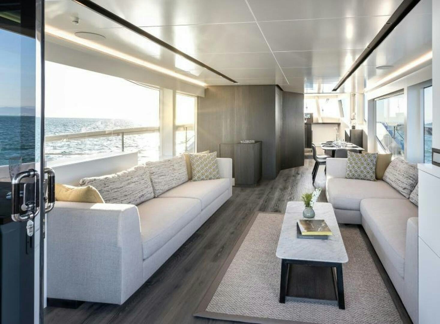 a living room with a large window aboard NUMARINE 22XP/07 Yacht for Sale