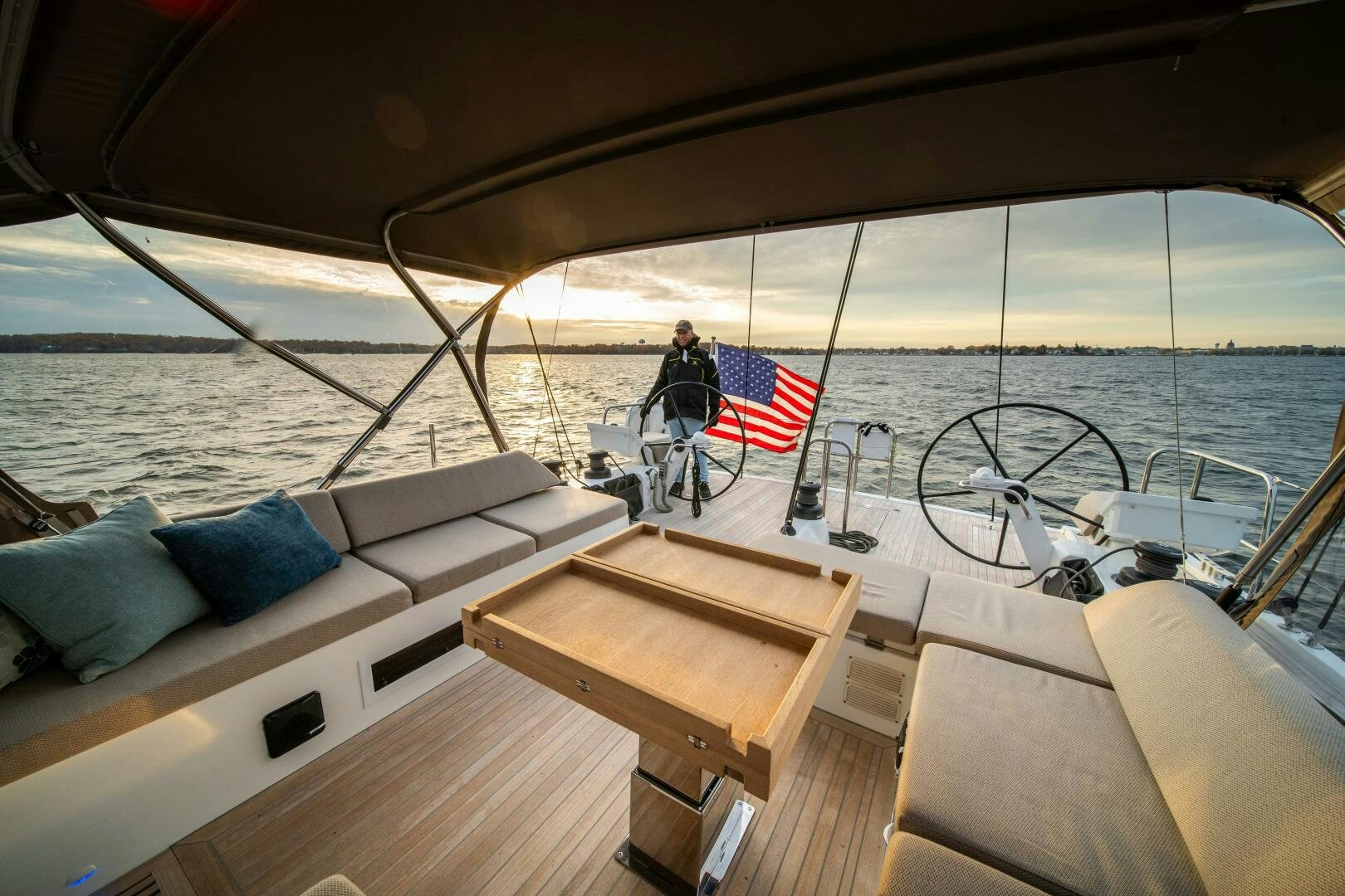a boat with a flag on the front aboard FORTITUDE Yacht for Sale