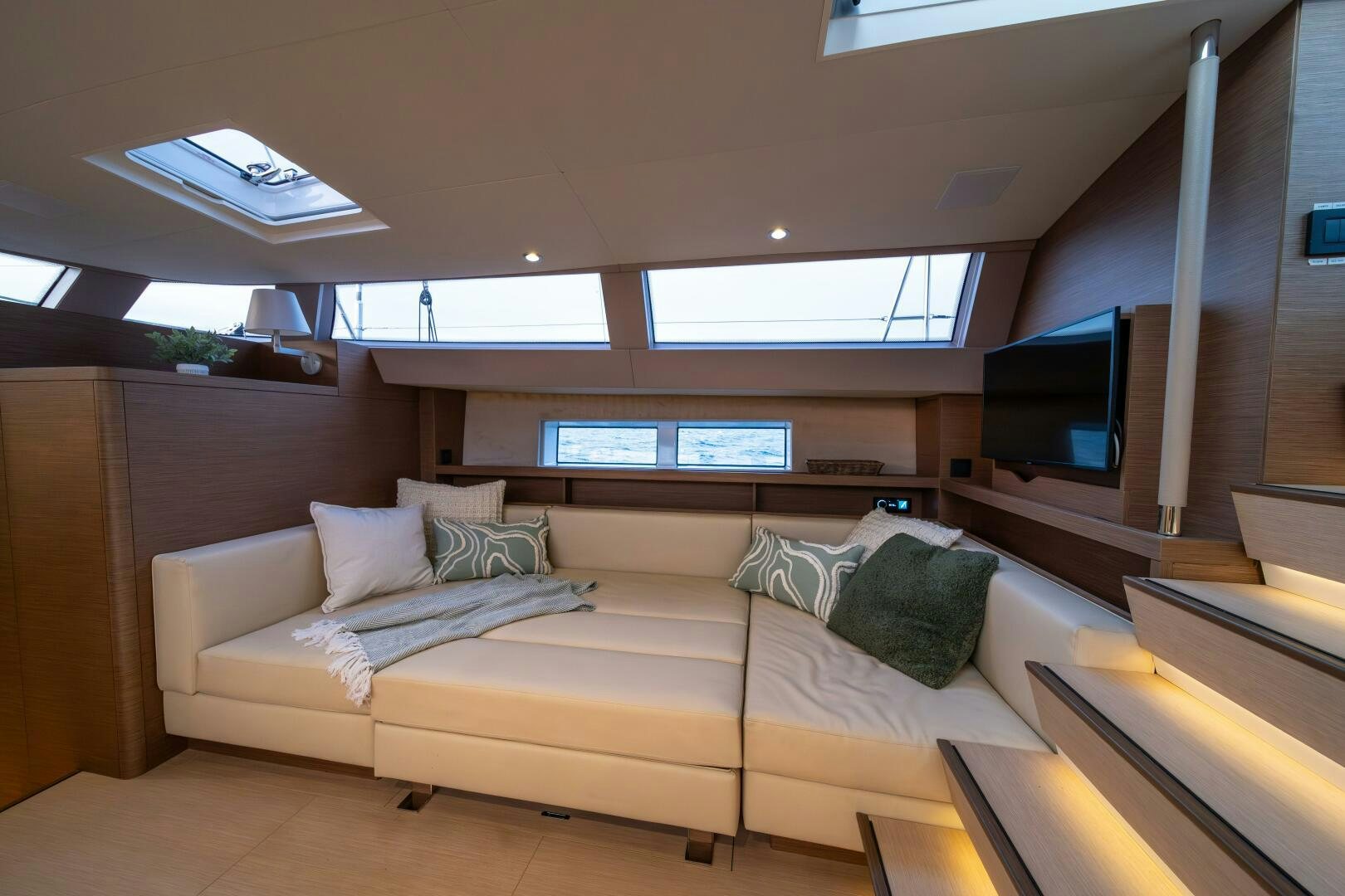 a couch in a room aboard FORTITUDE Yacht for Sale