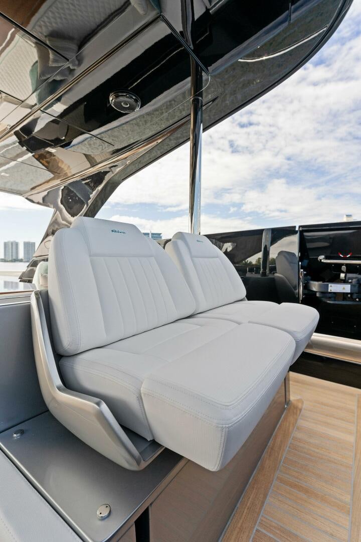 a white car with a large window aboard CORSARO SUPER Yacht for Sale