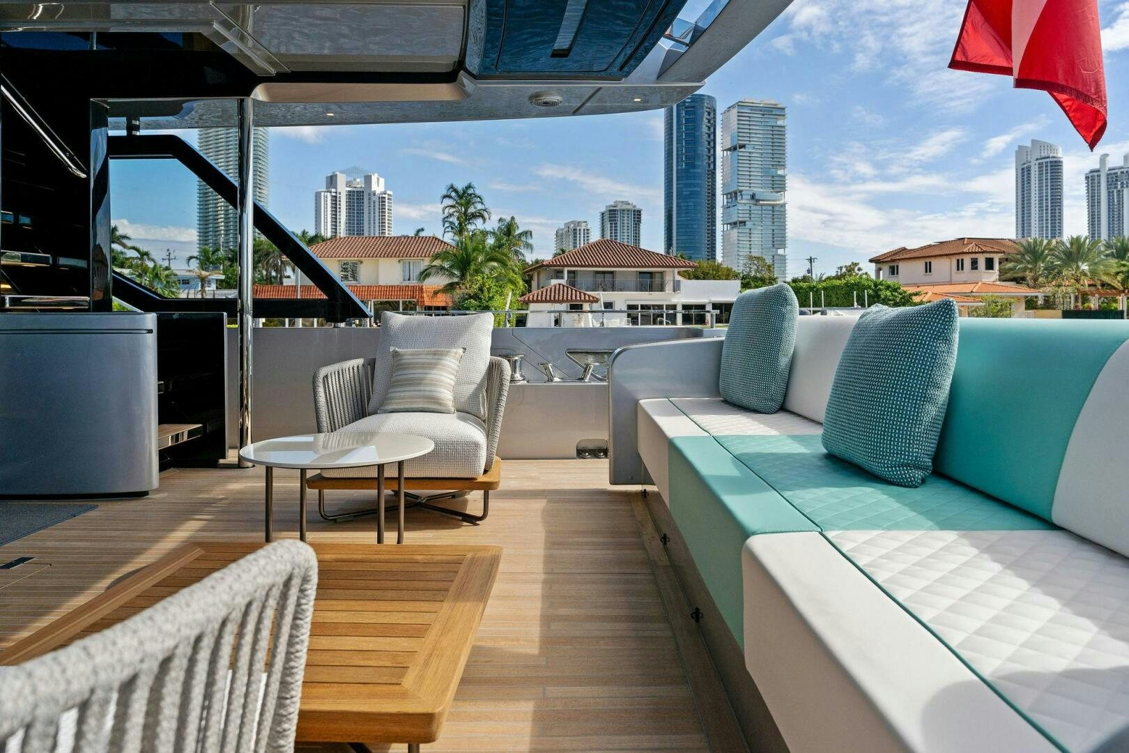 a room with a couch and a table and chairs aboard CORSARO SUPER Yacht for Sale