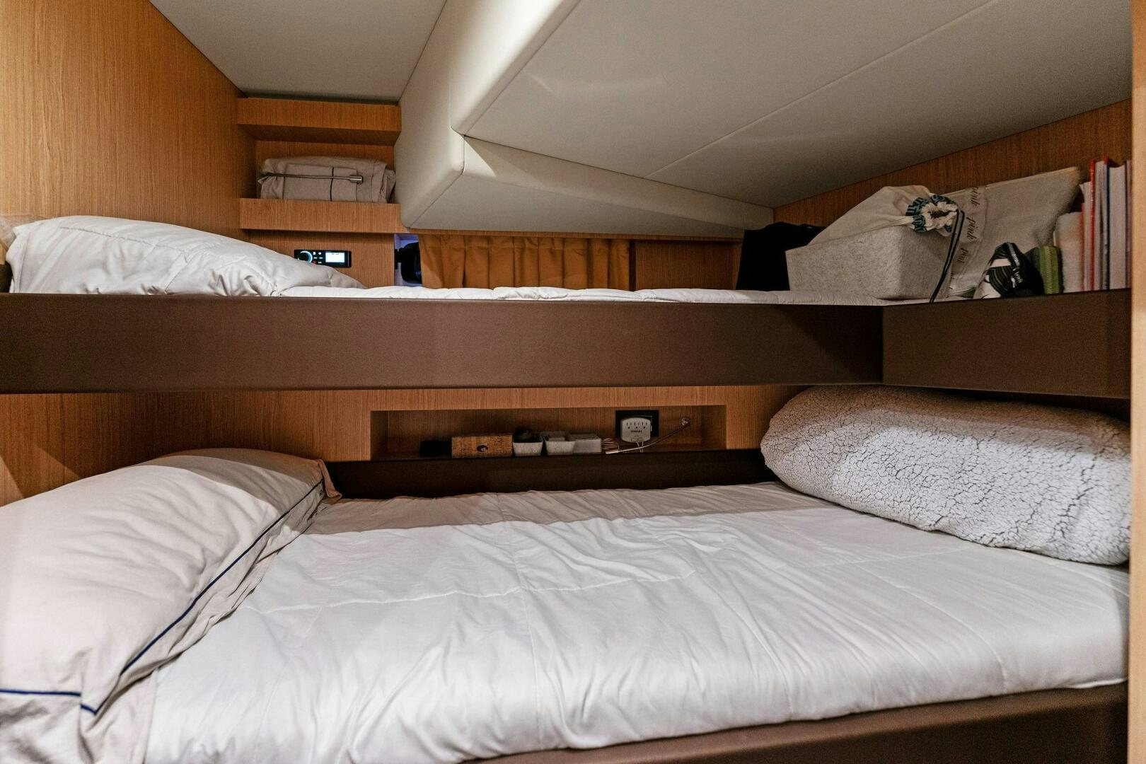 a bed with white sheets aboard CORSARO SUPER Yacht for Sale