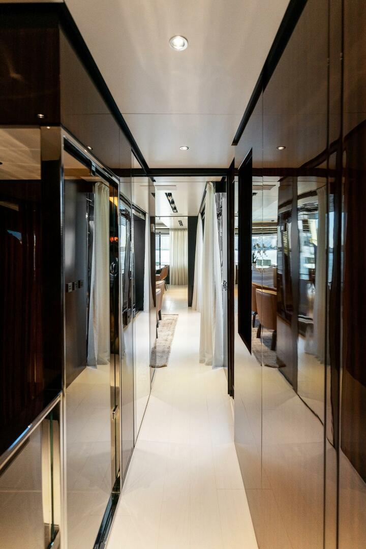 a hallway with doors aboard CORSARO SUPER Yacht for Sale