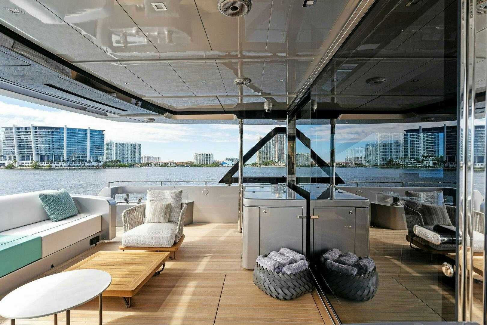 a room with a view of a city and a large body of water aboard CORSARO SUPER Yacht for Sale