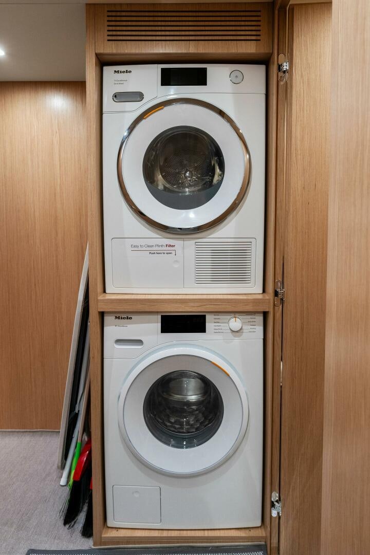 a white washing machine aboard CORSARO SUPER Yacht for Sale
