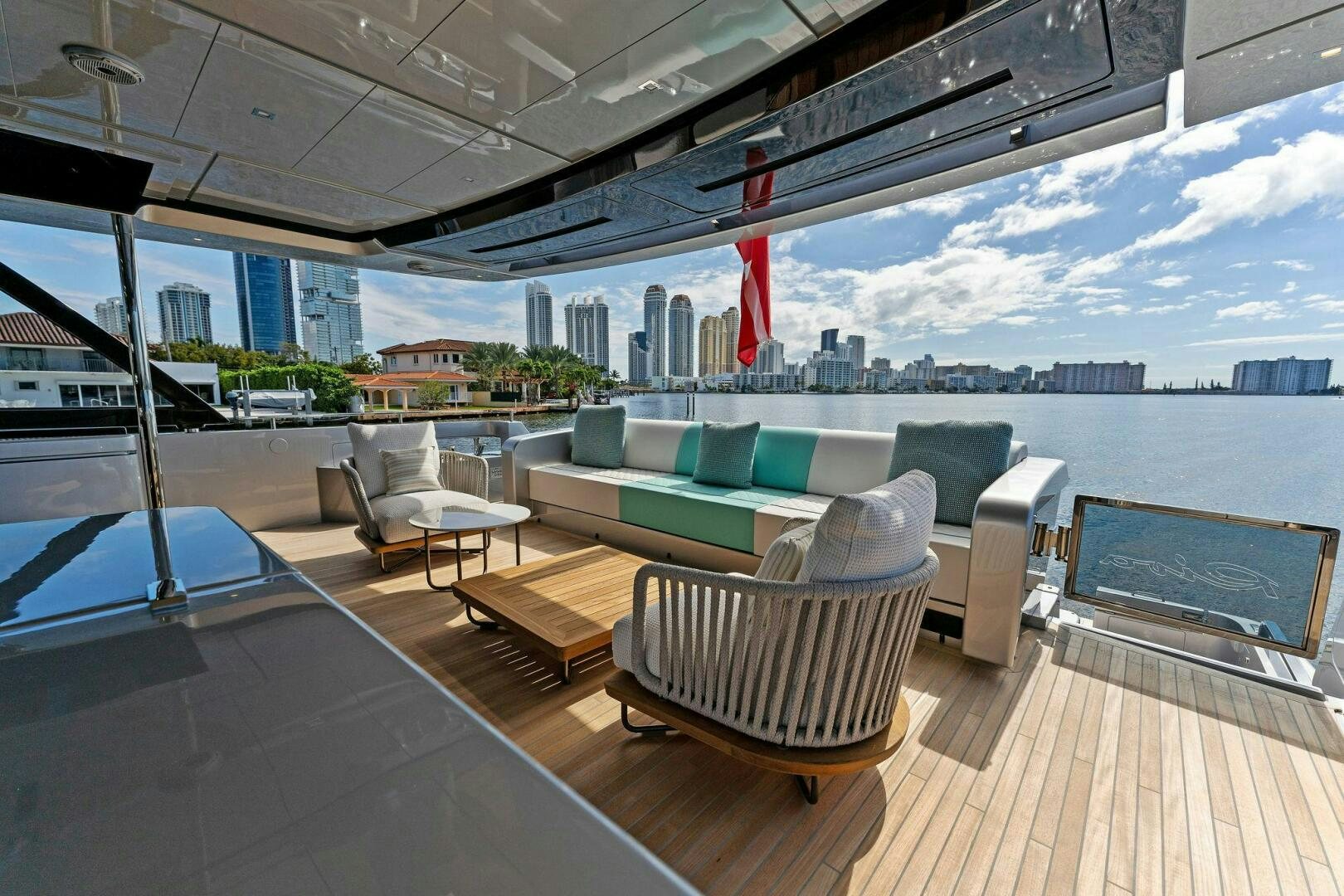 a large room with a large window and a view of a city aboard CORSARO SUPER Yacht for Sale
