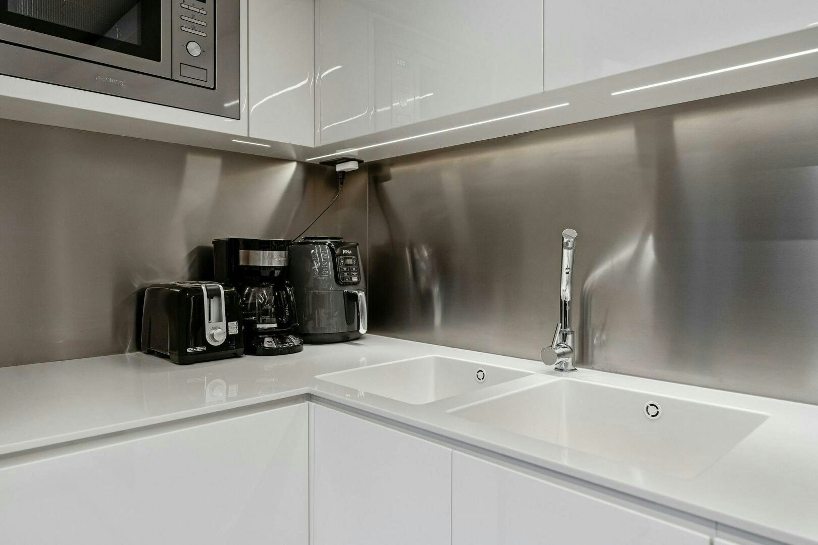 a coffee maker on a counter aboard CORSARO SUPER Yacht for Sale