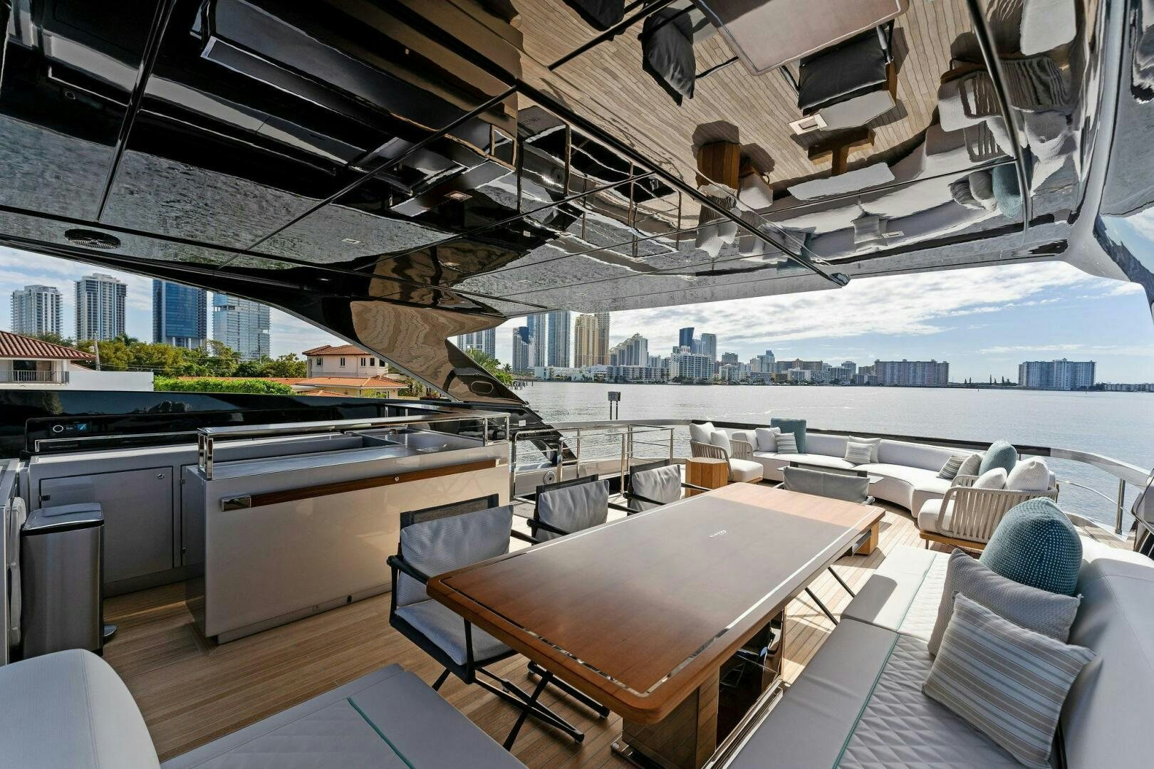 a room with a table and chairs aboard CORSARO SUPER Yacht for Sale