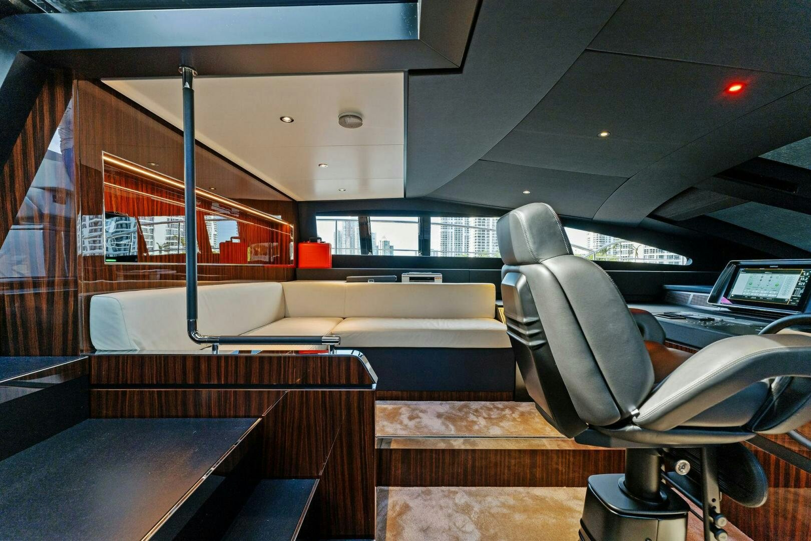 a bus with seats and a bench aboard CORSARO SUPER Yacht for Sale